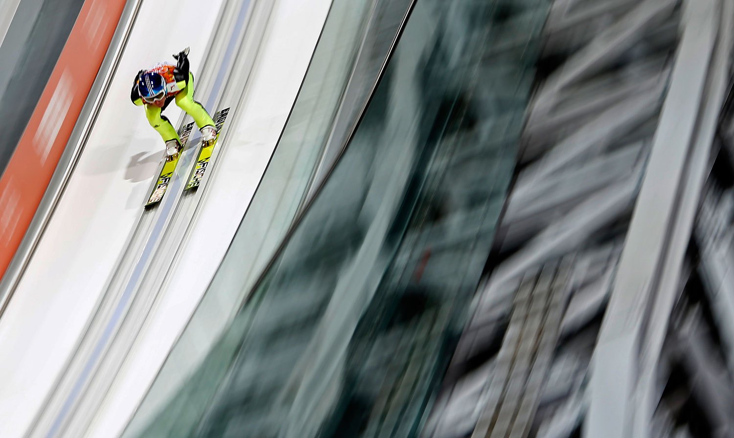 Germany's Severin Freund speeds down the ski jump in his trial jump of the men's ski jumping normal hill individual final event at the RusSki Gorki Ski Jumping Center in Rosa Khutor, Feb. 9, 2014.