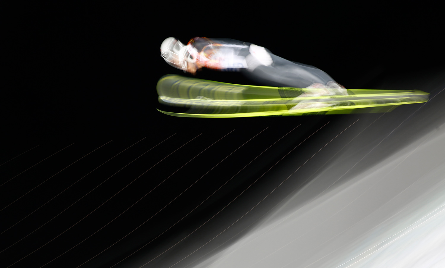 Japan's Reruhi Shimizu soars through the air during his trial jump in the men's ski jumping individual normal hill qualification round event at the Sochi 2014 Winter Olympic Games February 8, 2014.