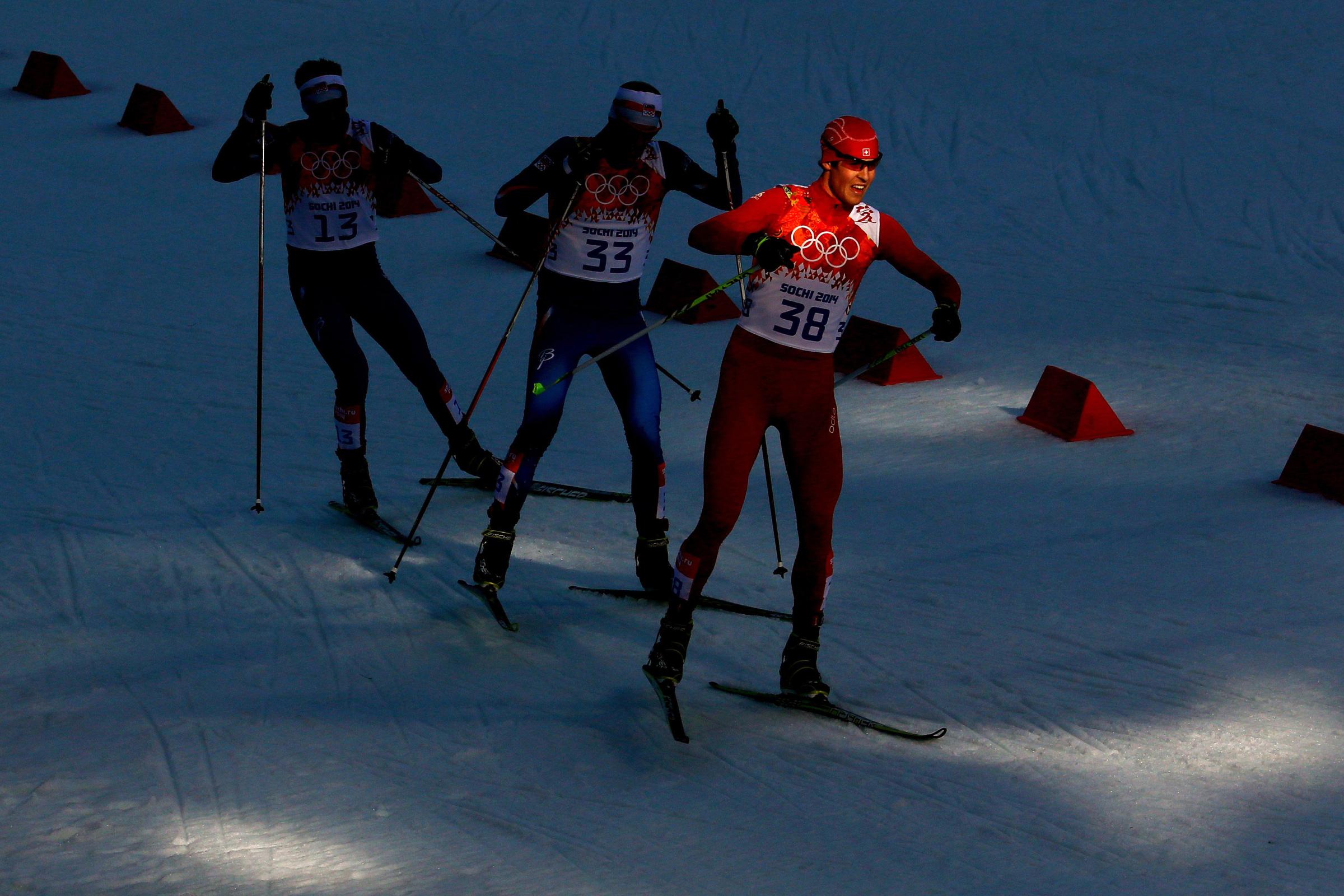 Tomas Portyk of the Czech Republic, Tomas Slavik of Czech Republic and Tim Hug of Switzerland in action during the Nordic Combined Individual Gundersen Normal Hill and 10km Cross Country.