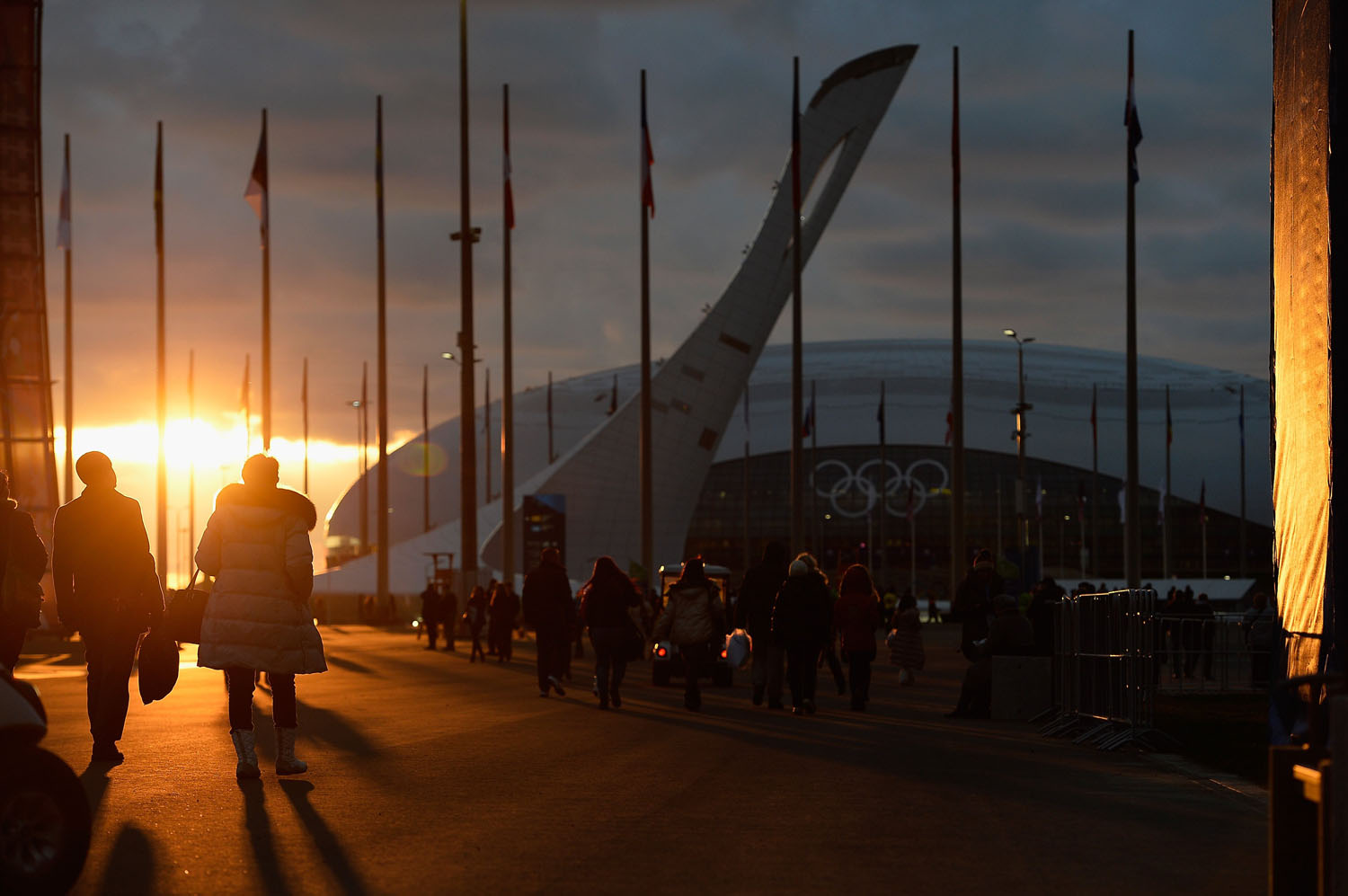 Visitors walk inside the Olympic Park prior to the Sochi 2014 Winter Olympics on February 6, 2014. (Pascal Le Segretain&mdash;Getty Images)