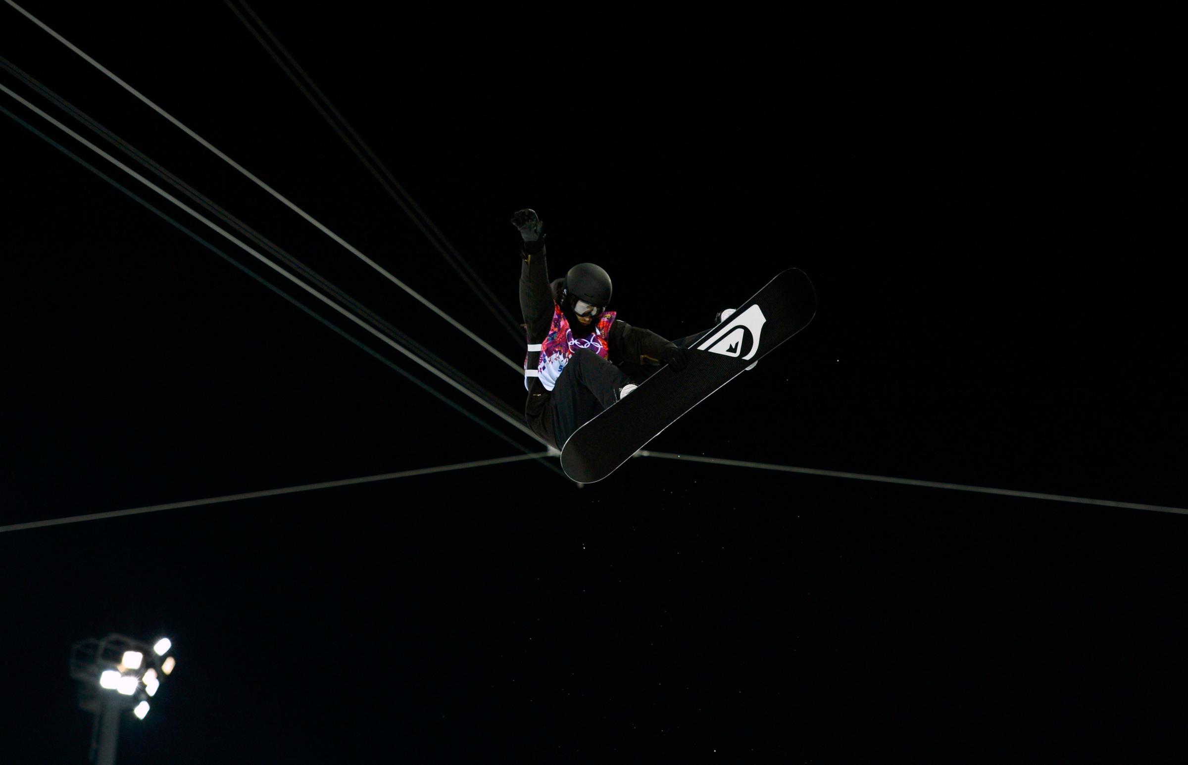 Switzerland's Iouri Podladtchikov performs a jump during the men's snowboard halfpipe semi-final even.