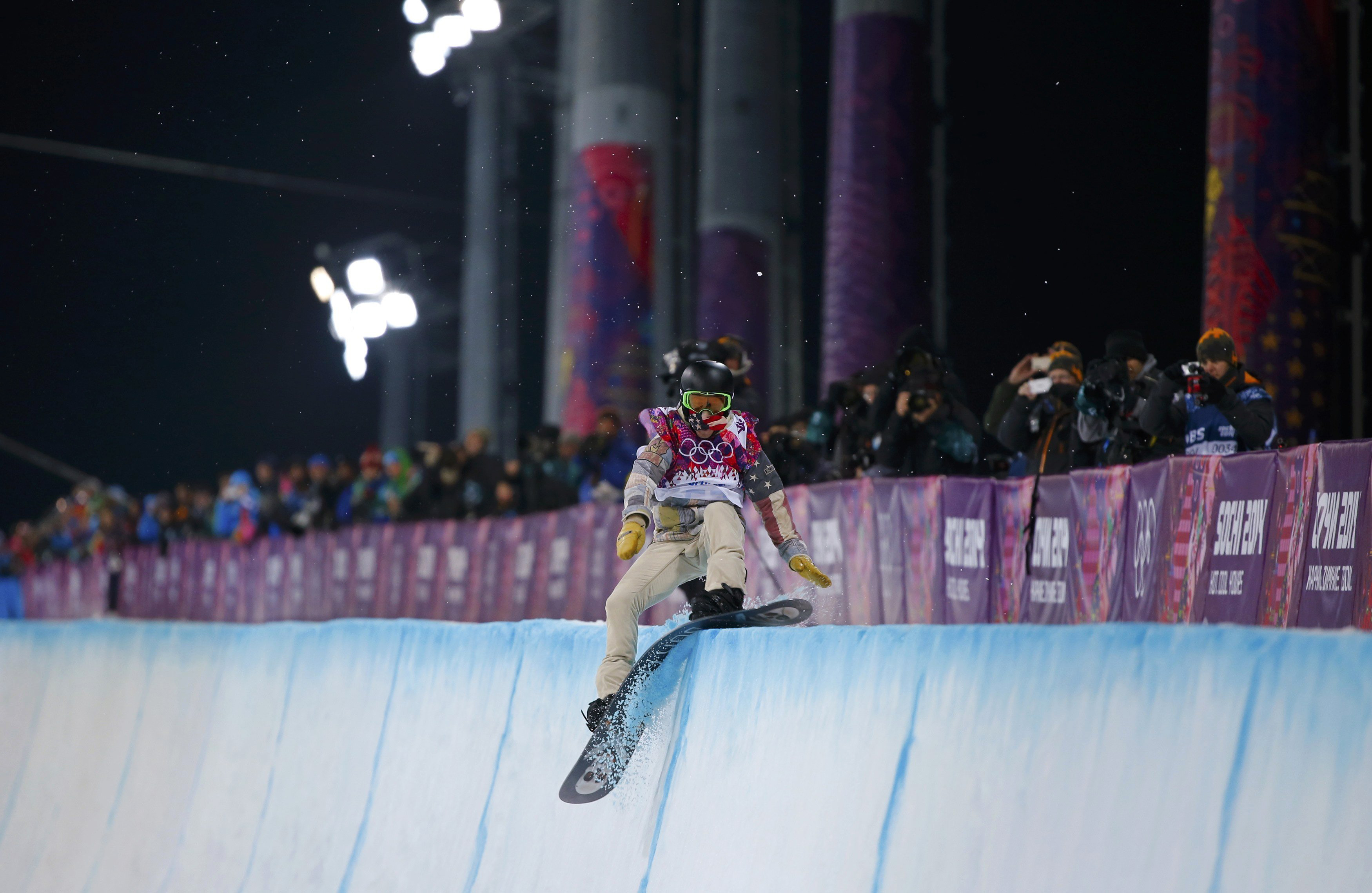 Shaun White of the U.S. crashes during the men's snowboard halfpipe final event. White finished in fourth place.