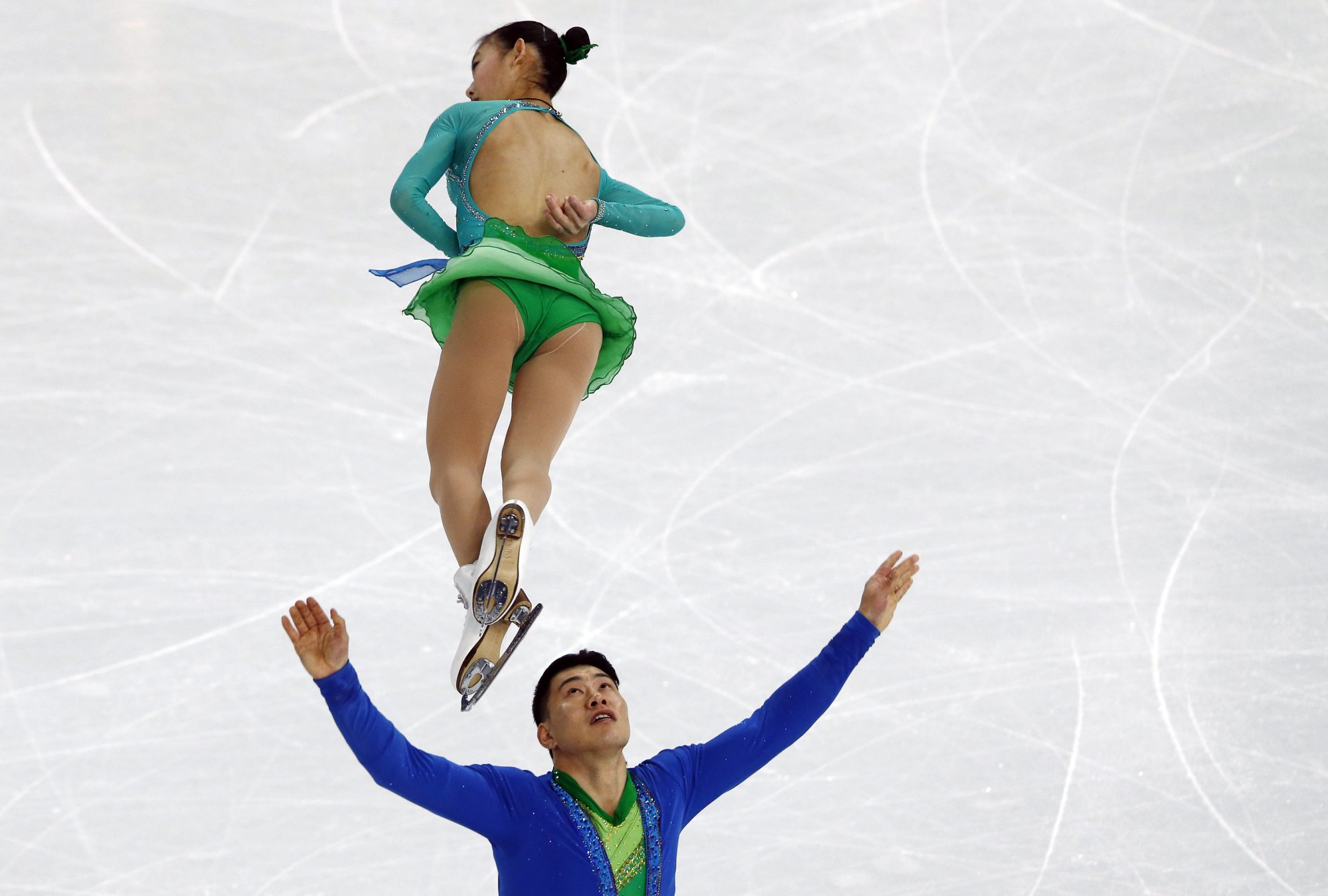 Peng Cheng and Zhang Hao of China perform in the Pairs Short Program of the Figure Skating Team event at Iceberg Skating Palace during the Sochi 2014 Olympic Games, February 6, 2014.