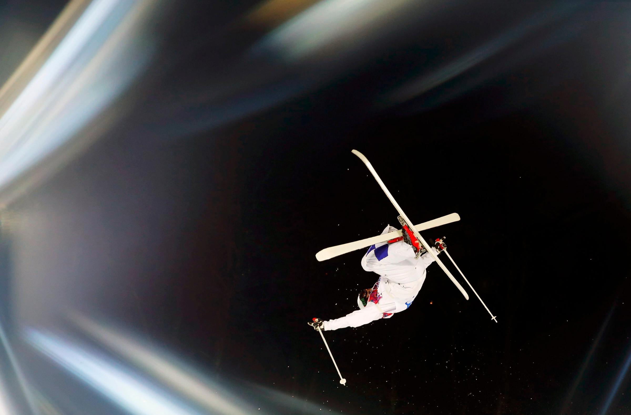 Finland's Arttu Kiramo performs a jump during the men's freestyle skiing moguls qualification round.