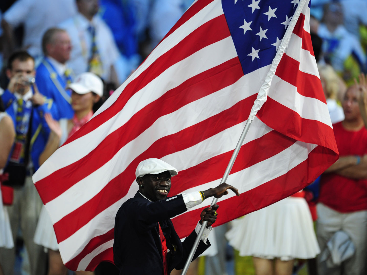 Track and Field athlete Lopez Lomong, flag-bearer of the U.S. Olympic team, marches during the opening ceremony of the Beijing 2008 Olympic Games.
