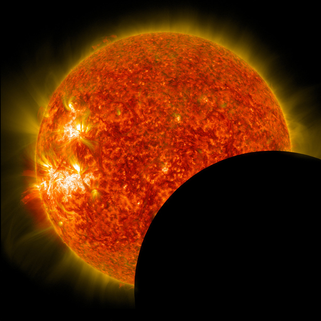 NASA's Solar Dynamics Observatory captured this image of the moon crossing in front of ithe sun on Jan. 30, 2014, at 10:30 a.m. EST.