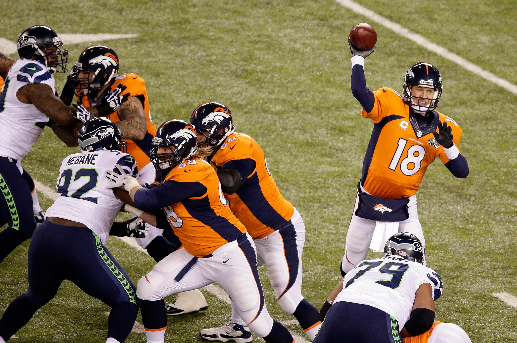 Denver Broncos' Peyton Manning throws a pass during the first half.