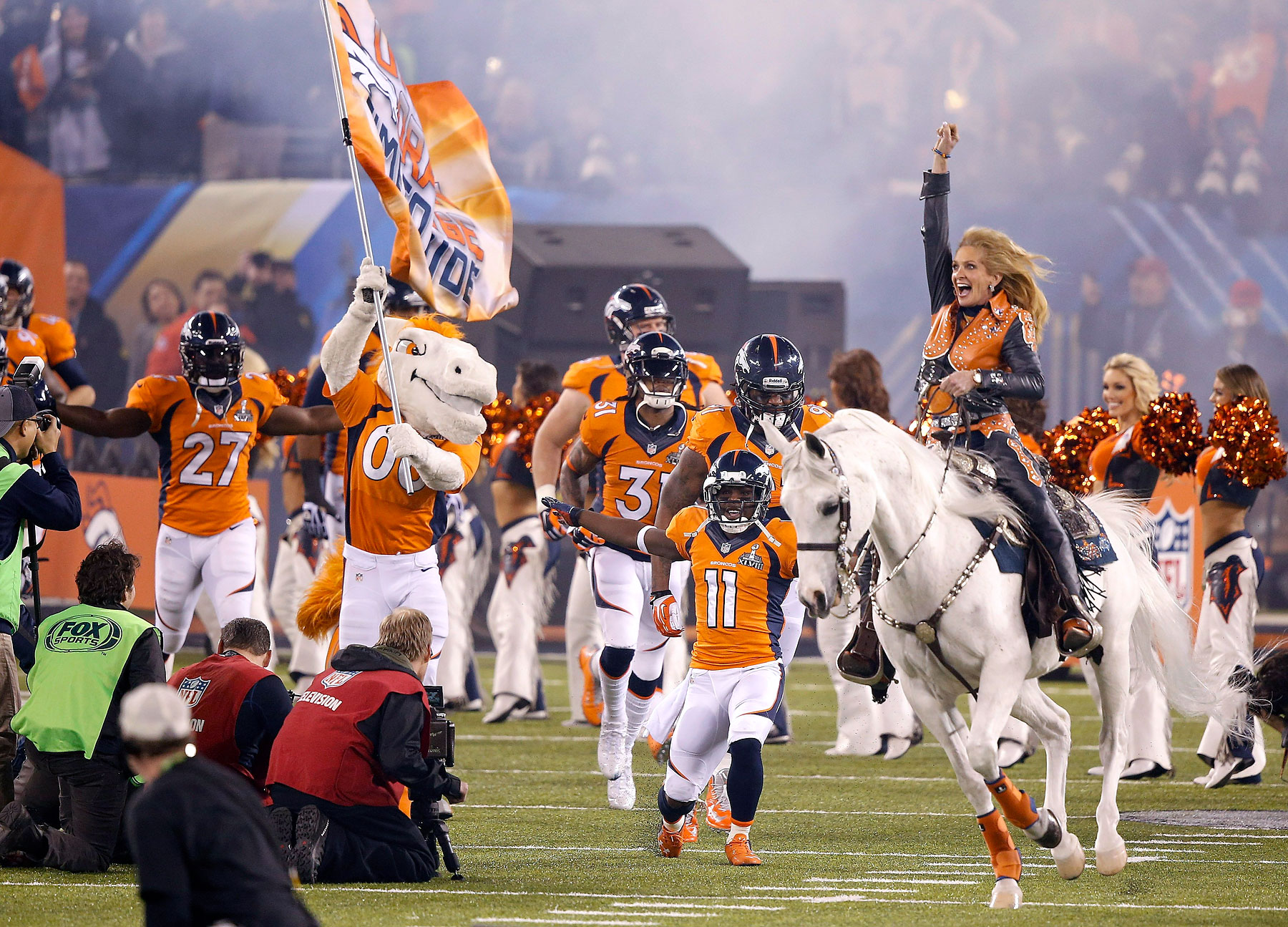 Thunder leads the Denver Broncos players onto the field before the NFL Super Bowl XLVIII.