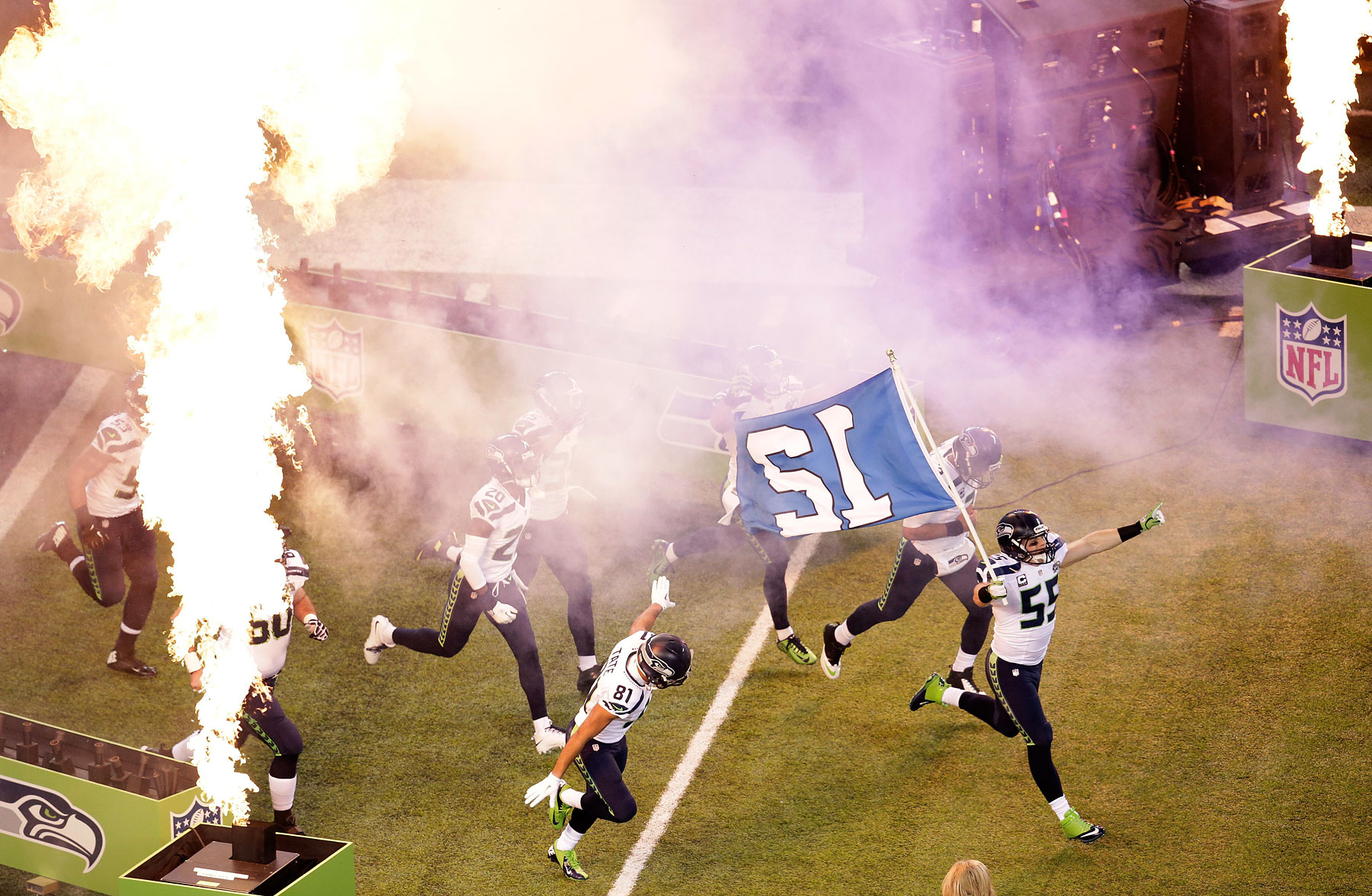 Linebacker Heath Farwell of the Seattle Seahawks leads the team onto the field at start of Super Bowl XLVIII .