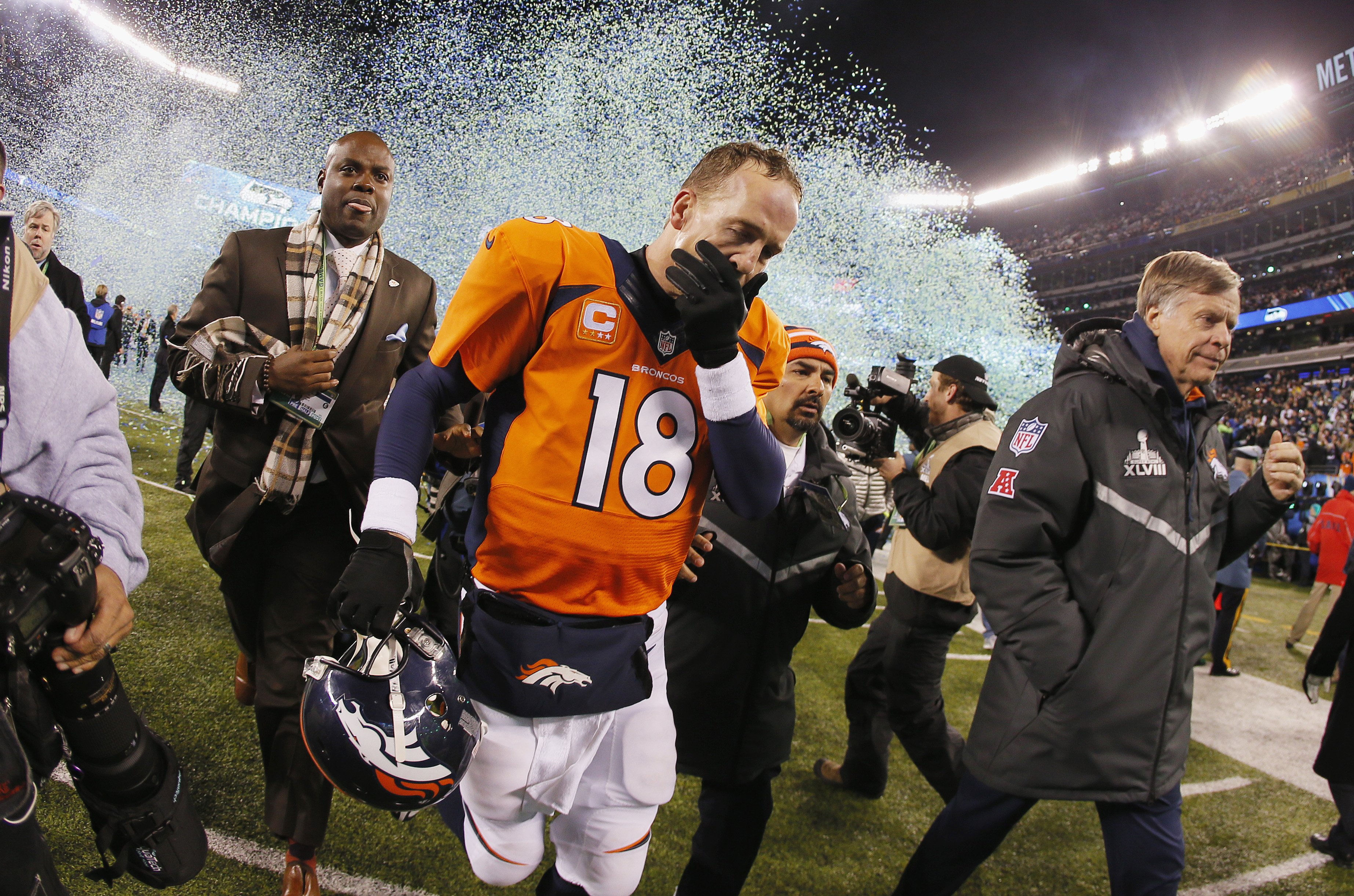 Quarterback Peyton Manning of the Denver Broncos reacts as he walks off the field after their 43-8 loss to the Seattle Seahawks during Super Bowl XLVIII. (Kevin C. Cox / Getty Images)