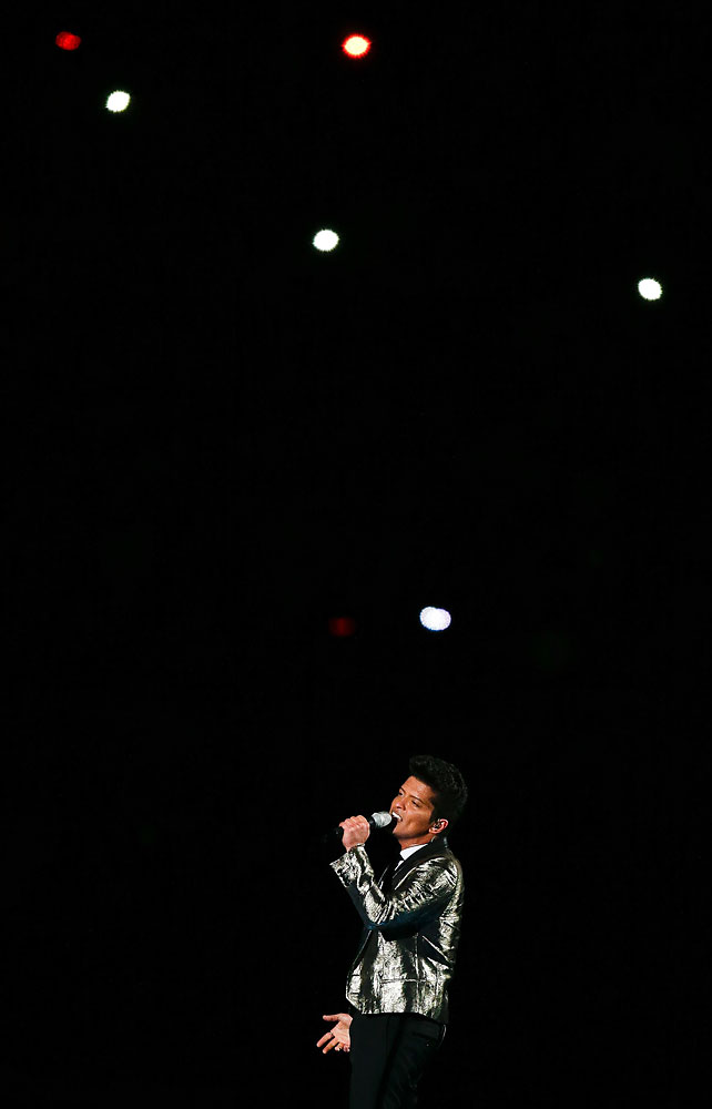 Bruno Mars performs during the halftime show of the NFL Super Bowl XLVIII football game between the Seattle Seahawks and the Denver Broncos Sunday, Feb. 2, 2014, in East Rutherford, N.J.