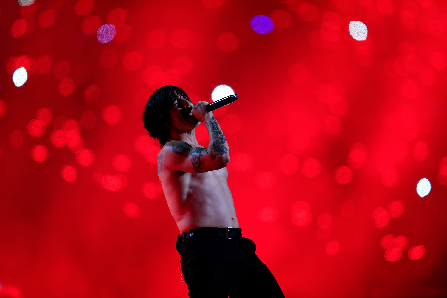 Anthony Kiedis of the Red Hot Chili Peppers performs during the Pepsi Super Bowl XLVIII Halftime Show at MetLife Stadium on February 2, 2014 in East Rutherford, New Jersey.
