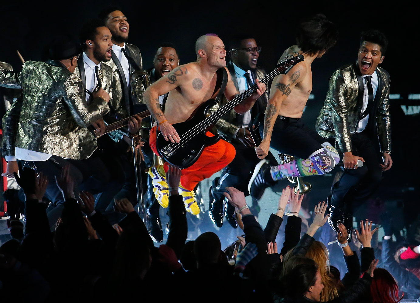 The Red Hot Chili Peppers and Bruno Mars perform during the halftime show of the NFL Super Bowl XLVIII football game between the Seattle Seahawks and the Denver Broncos Sunday, Feb. 2, 2014, in East Rutherford, N.J.
