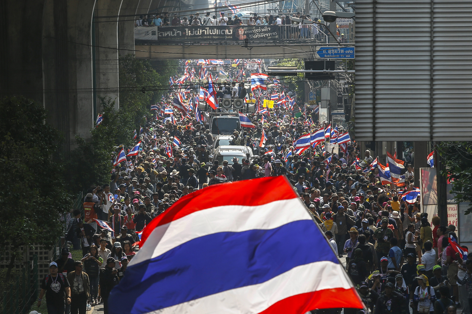 Anti-government protesters take part in a rally in central Bangkok