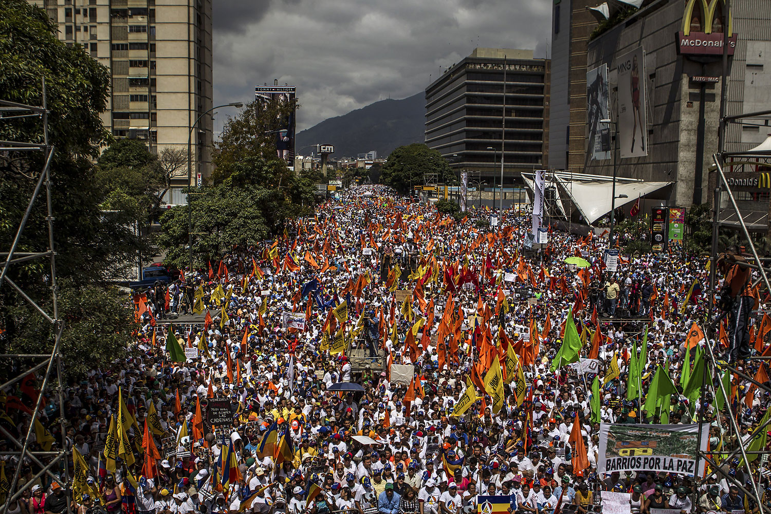 Supporters of the Venezuelan opposition rally on a street in Caracas, Feb. 22, 2014.
