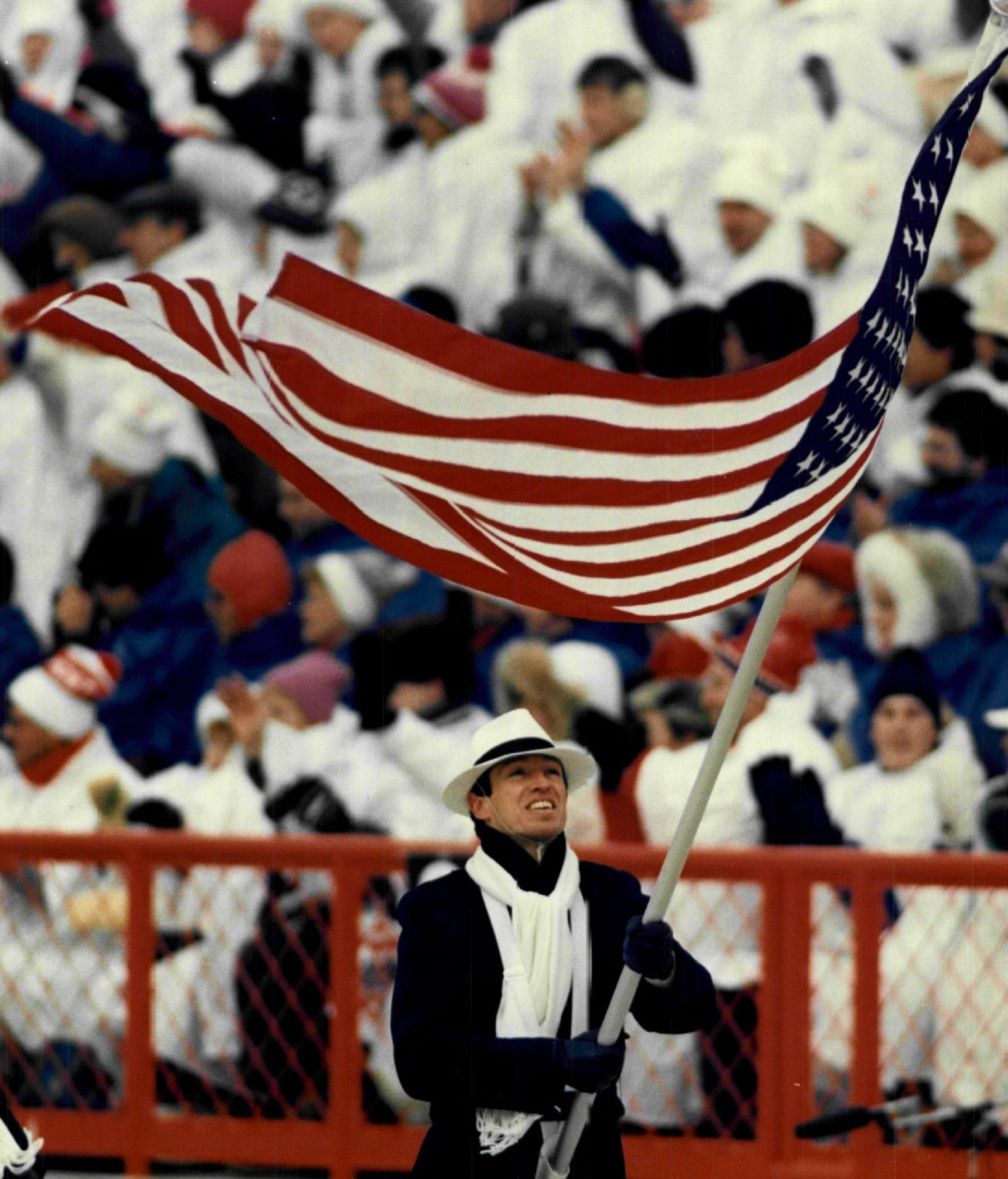 Biathlon athlete Lyle Nelson carries the flag during the opening of the 1988 Winter Olympics in Calgary, Aberta, Canada.