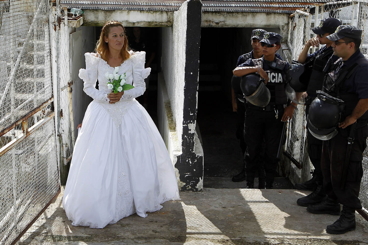 Feb. 4, 2014. Elena Vargas (L) prior of her wedding with her future husband Marcelo Gomez (not pictured) at Jardines del Hipodromo stadium in Montevideo, Uruguay.