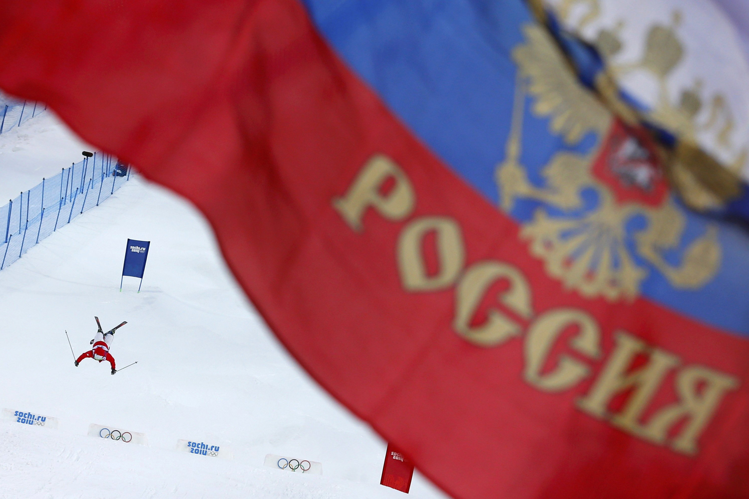 Vaculikova of the Czech Republic performs a jump during the women's freestyle skiing moguls qualification round at the Sochi 2014 Winter Olympics in Rosa Khutor