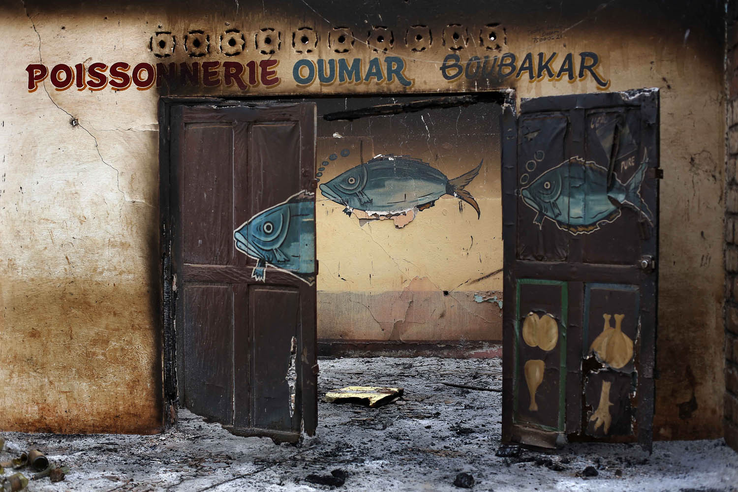 Feb. 4, 2014. A Muslim owned fish shop stands looted in the Miskin district of Bangui, Central African Republic.