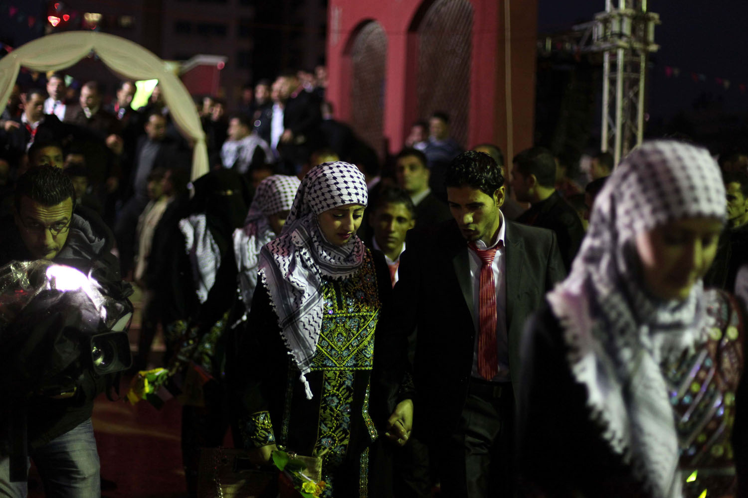 PALESTINIAN COUPLES TAKE PART IN A MASS WEDDING CEREMONY IN GAZA CITY
