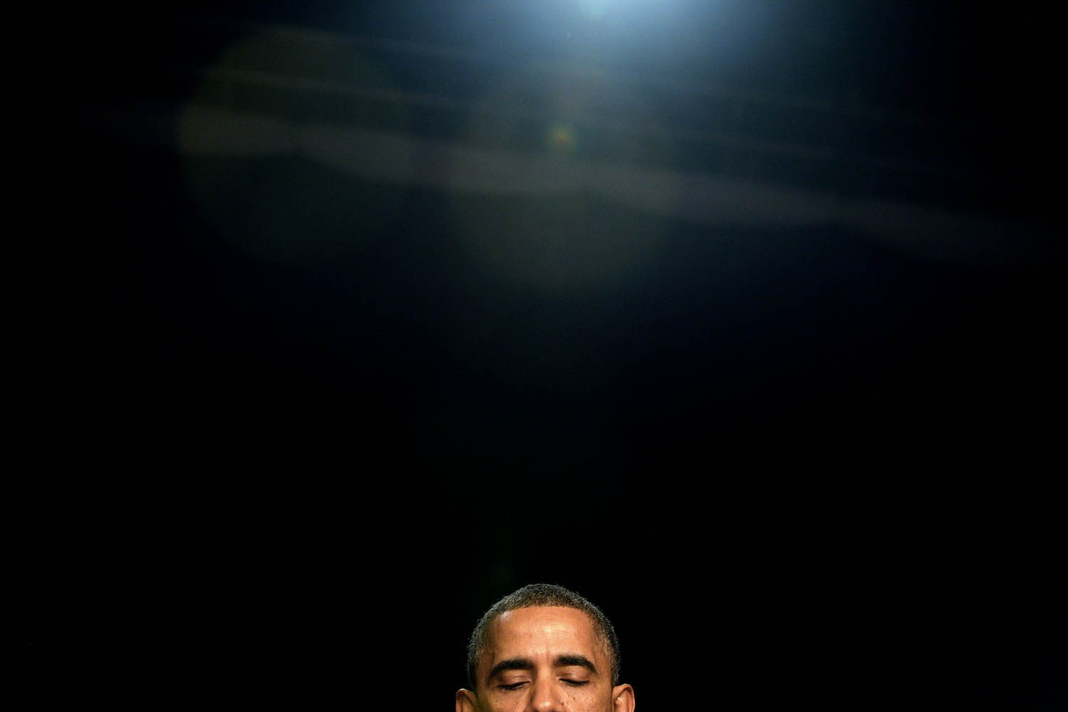 Feb. 6, 2014. President Barack Obama prays during the National Prayer Breakfast at the Washington Hilton in Washington.