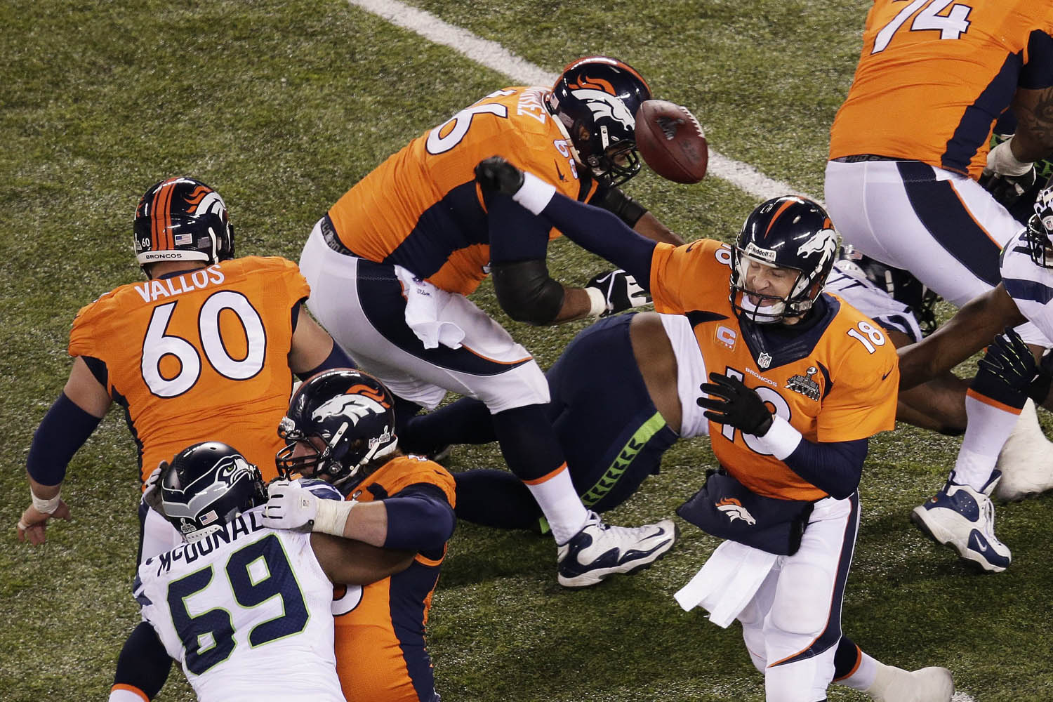 Feb. 2, 2014. Quarterback Peyton Manning of the Denver Broncos has a pass blocked by the Seattle Seahawks during Super Bowl XLVIII at MetLife Stadium in East Rutherford, N.J.