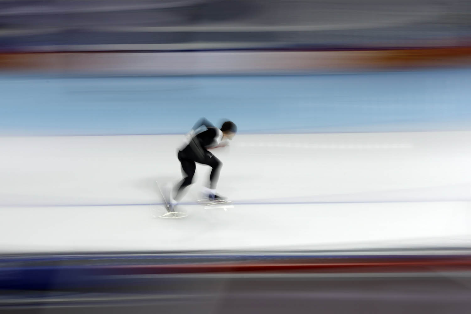 Feb. 6, 2014. A speedskater trains at the Adler Arena Skating Center during the 2014 Winter Olympics in Sochi, Russia.