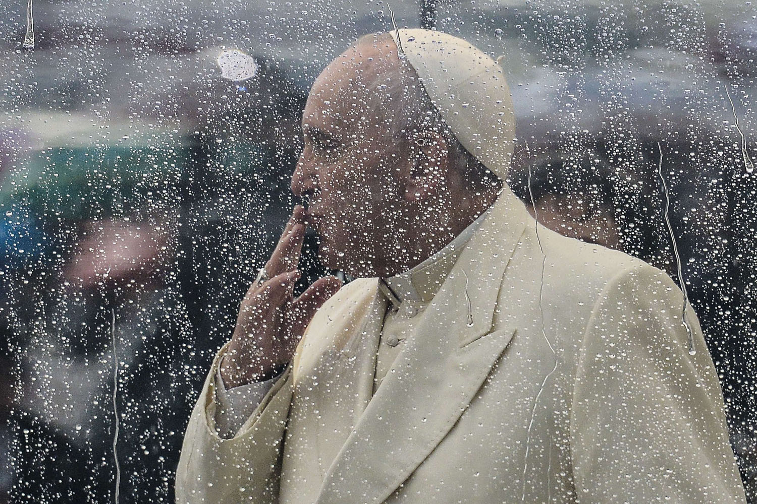 Feb. 5, 2014. Pope Francis blows a kiss to pilgrims gathered at Saint Peter's square in the Vatican upon his arrival to lead the general weekly audience.