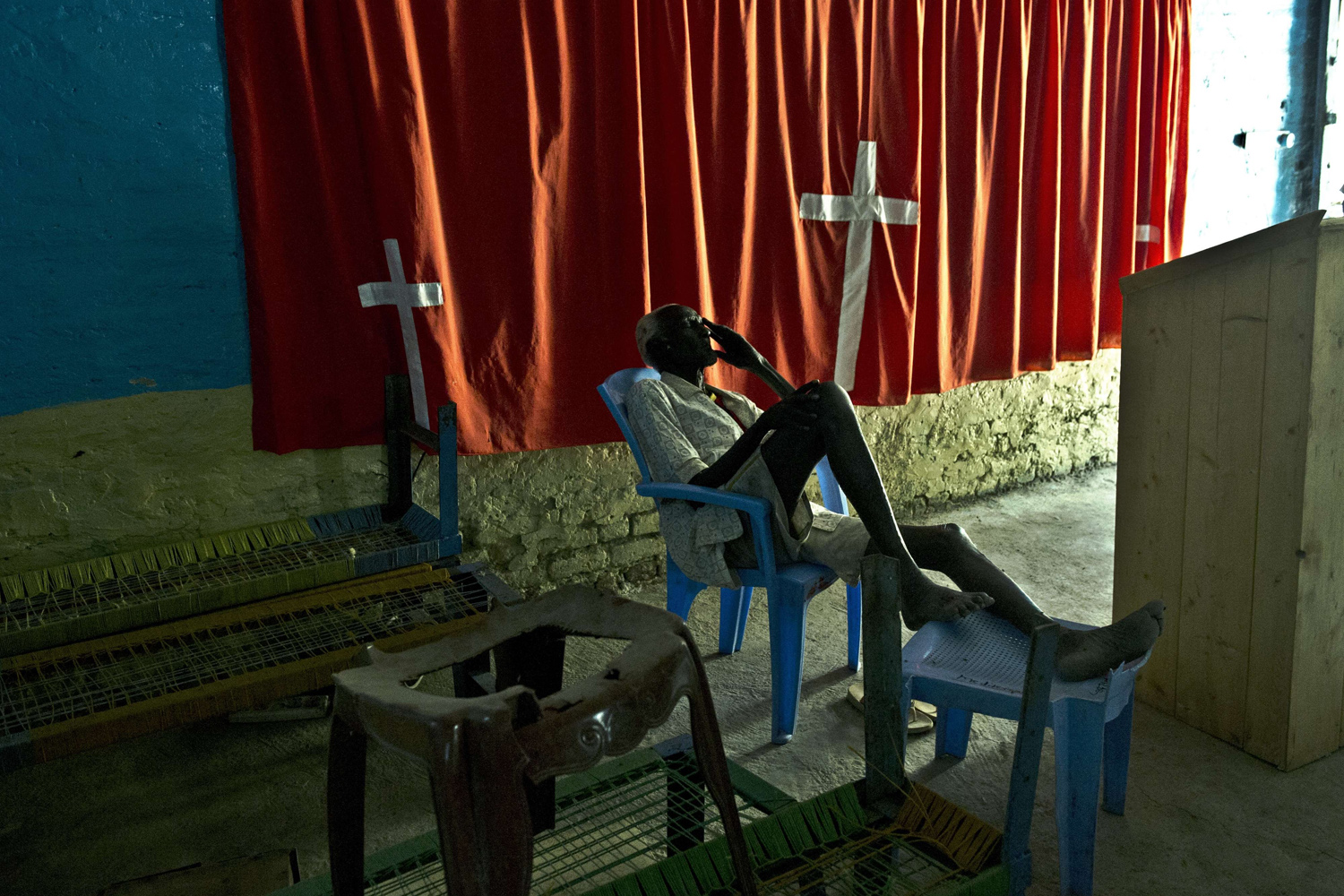 Feb. 5, 2014. A patient waits to be treated by Medecins Sans Frontieres (MSF) staff at a temporary clinic in a church of Malakal.