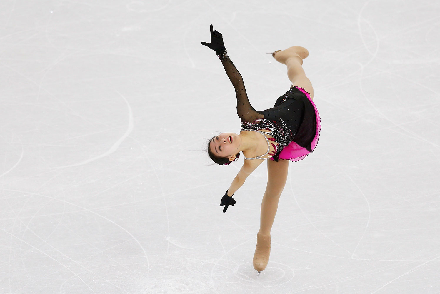 China's Zijun Li competes during the Figure Skating Women's Short Program at the Sochi 2014 Winter Olympics