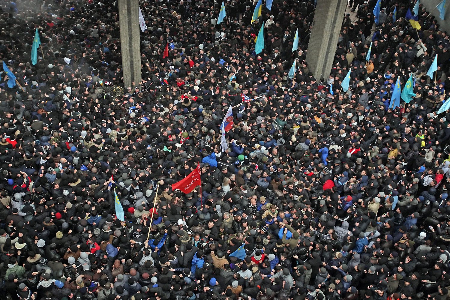 Ukrainian and Russian supporters clash during a protest near the Parliament building in Simferopol, Feb. 26, 2014.