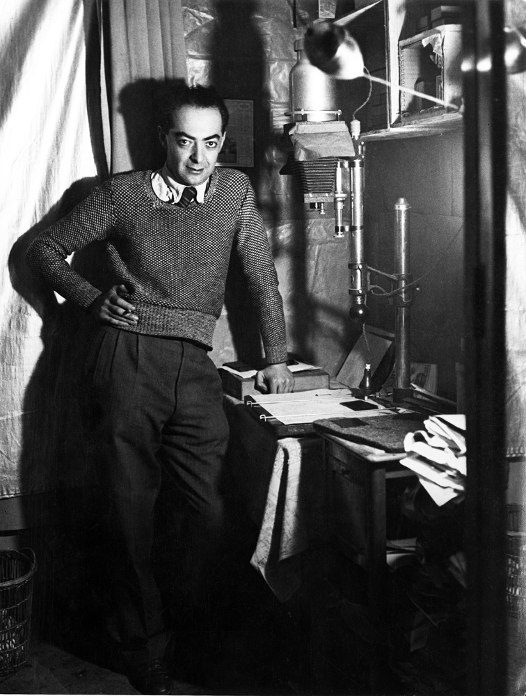 Brassaï in his photo lab, 1932.