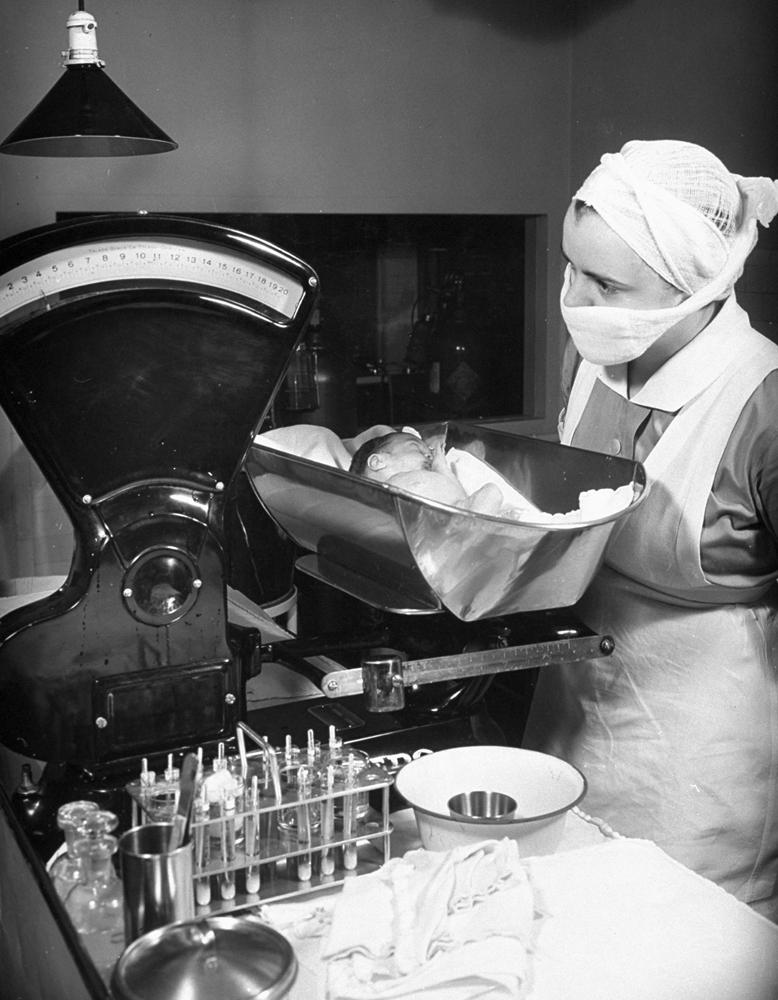 Nurse with premature baby, Boston, 1939.