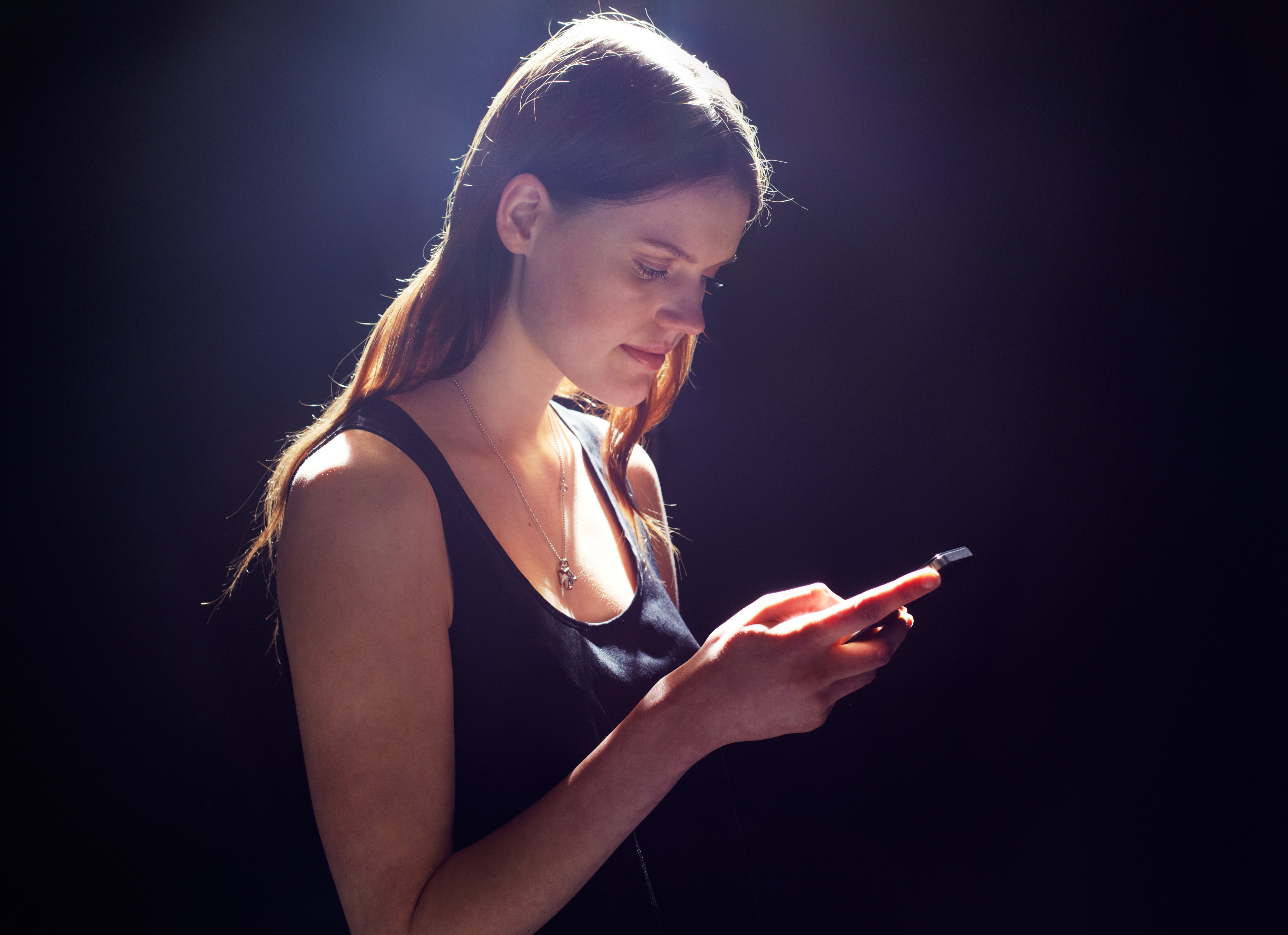 Young woman with smart phone.