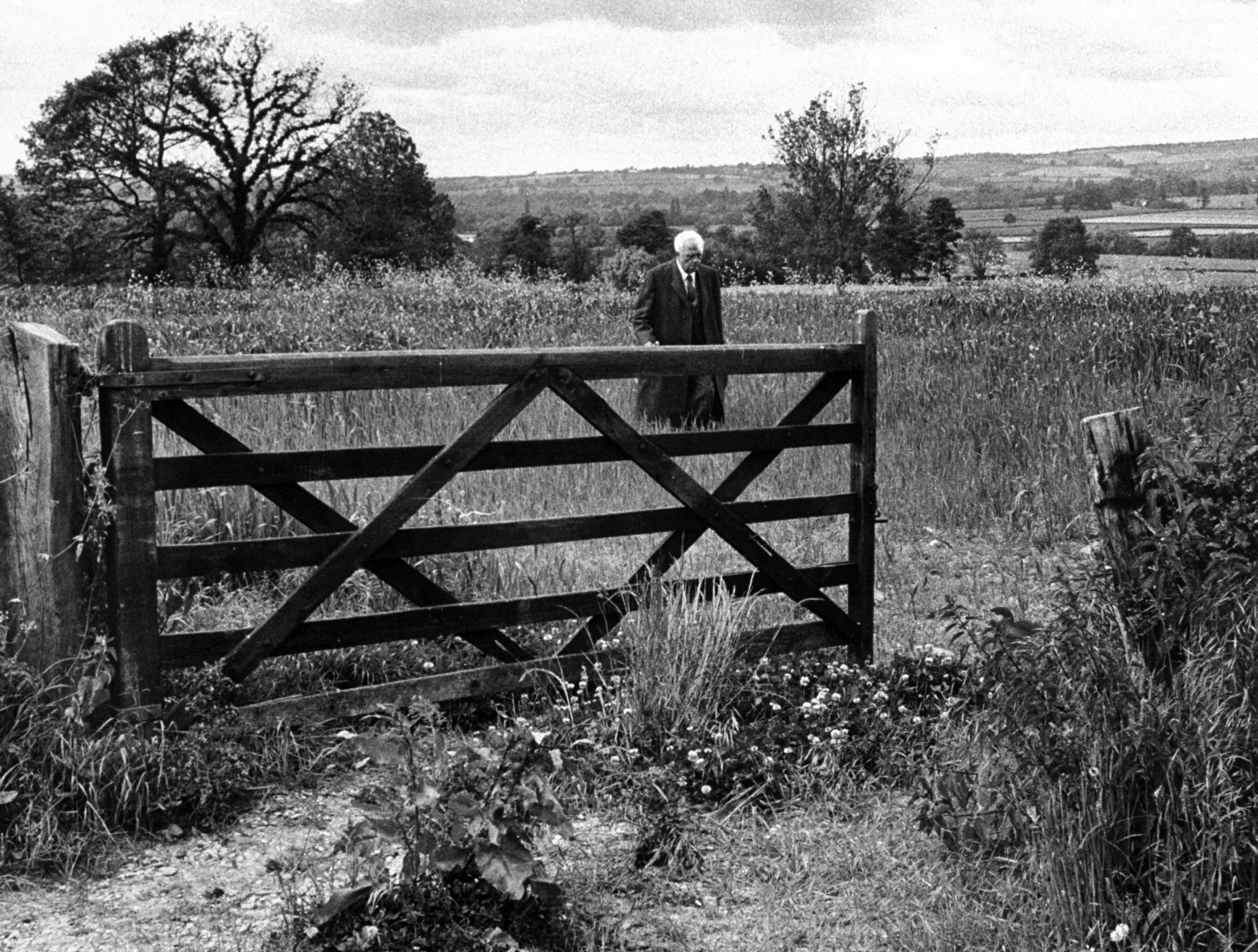Robert Frost in 1957, during a visit to the English countryside where he once lived.