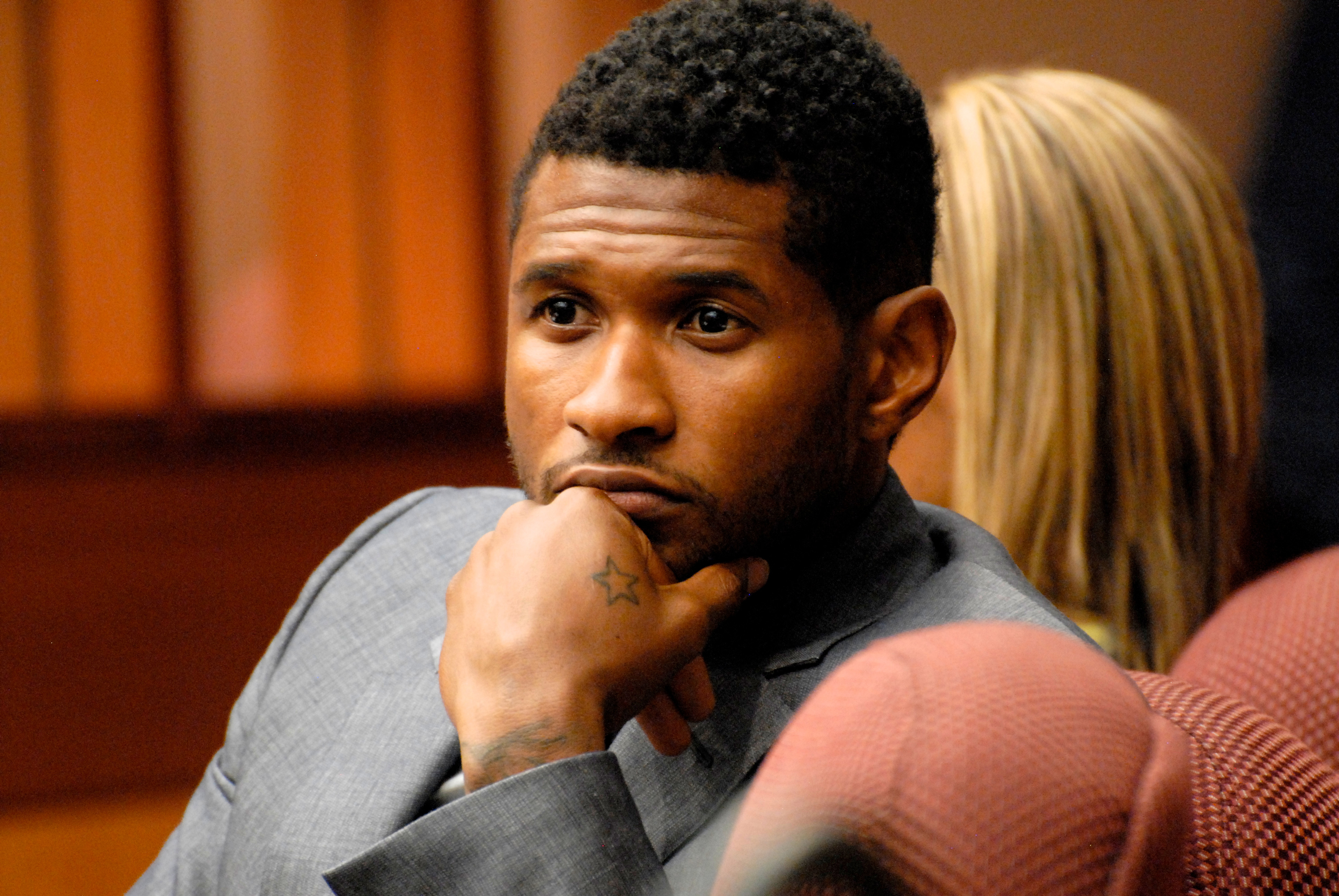 Usher Raymond attends a hearing to discuss child custody with his ex-wife Tameka Foster at Fulton County State Court on August 16, 2012 in Atlanta, Georgia. (John E. Davidson&mdash;Getty Images)