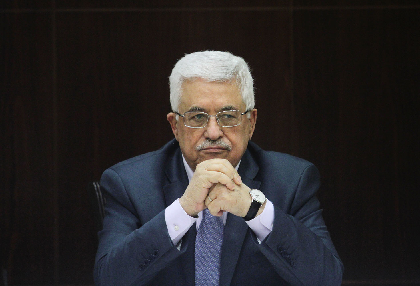 Palestinian National Authority President Mahmoud Abbas chairs a Cabinet session in the West Bank city of Ramallah on July 28, 2013 (Issam Romawi—AFP/Getty Images)