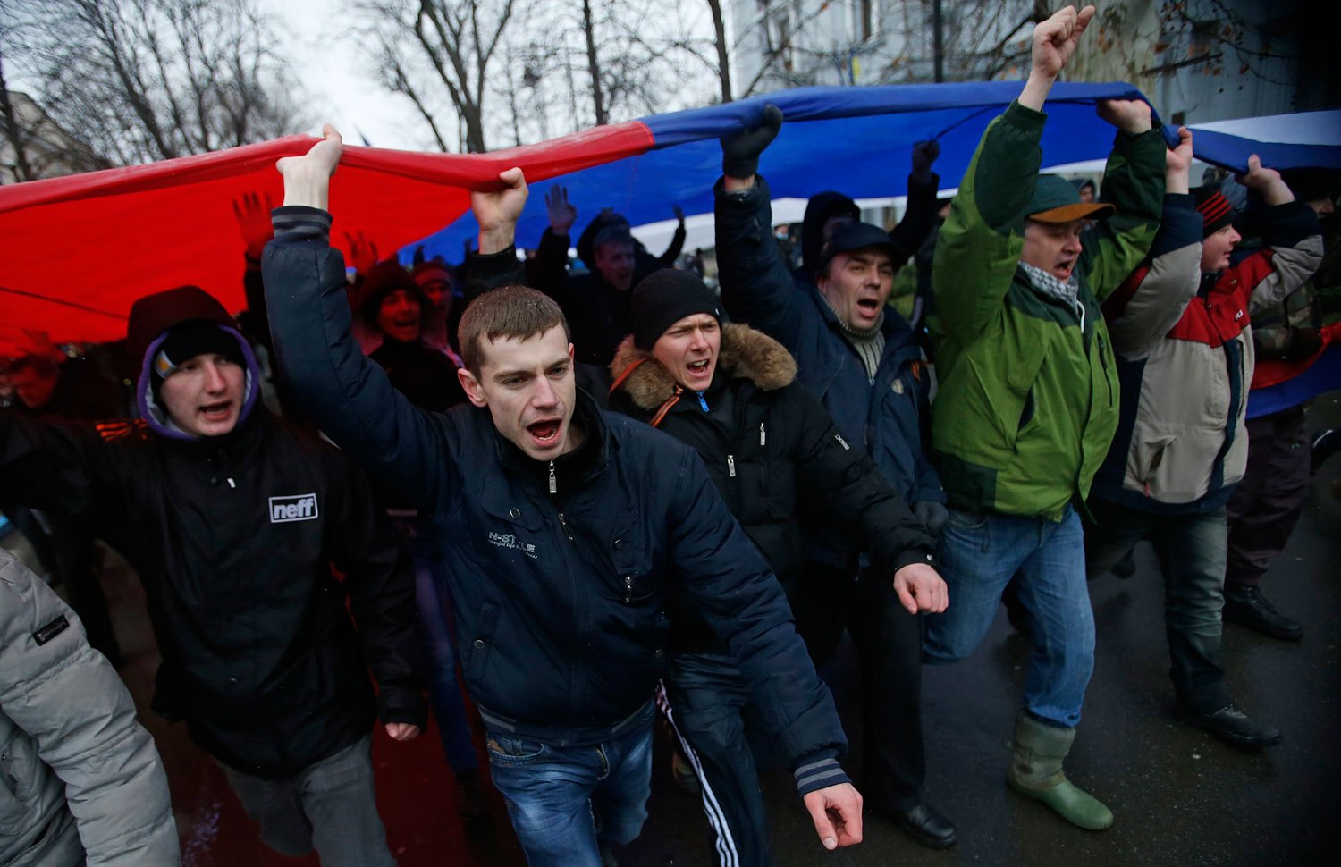 People carry a giant Russian flag during a pro-Russian rally in Simferopol, Feb. 27, 2014.