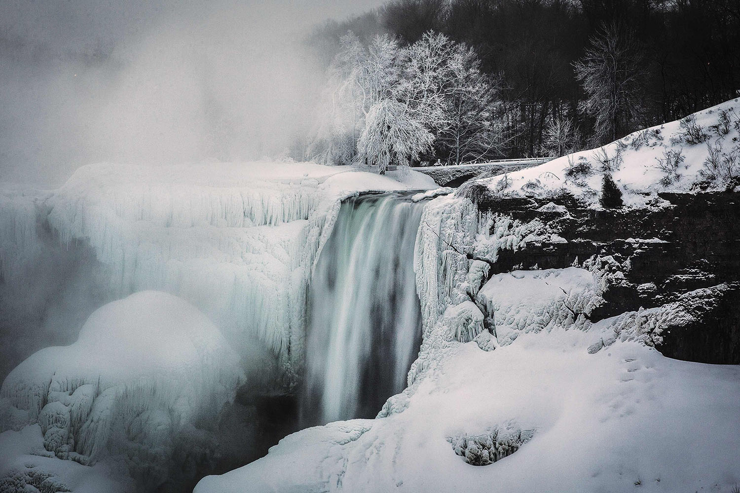 A partially frozen Niagara Falls is seen on the American side during sub freezing temperatures in Niagara Falls