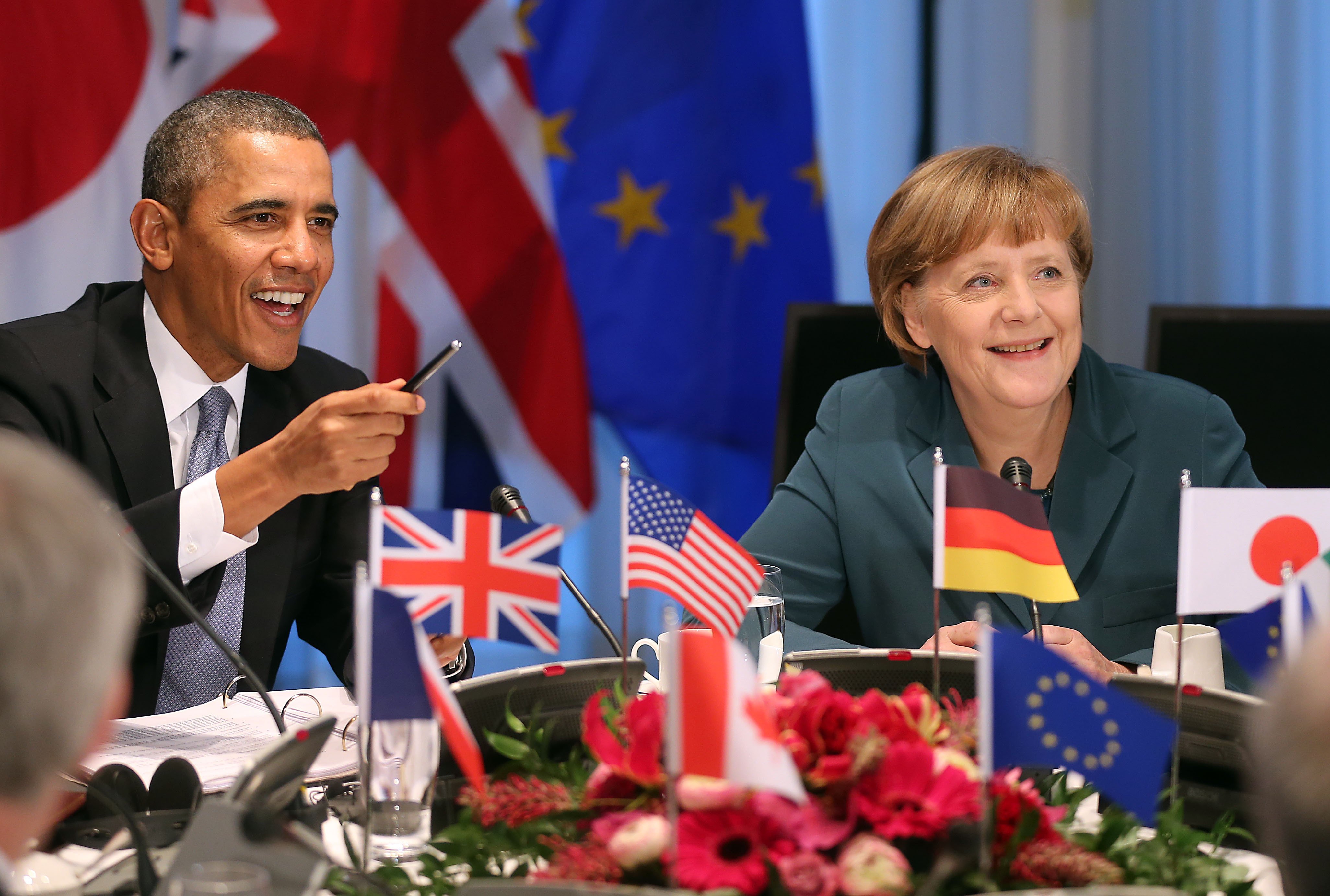 President Barack Obama and Chancellor Angela Merkel at a meeting of the G-7 in the Hague on March 24, 2014 (Oliver Berg—DPA/Zumapress)