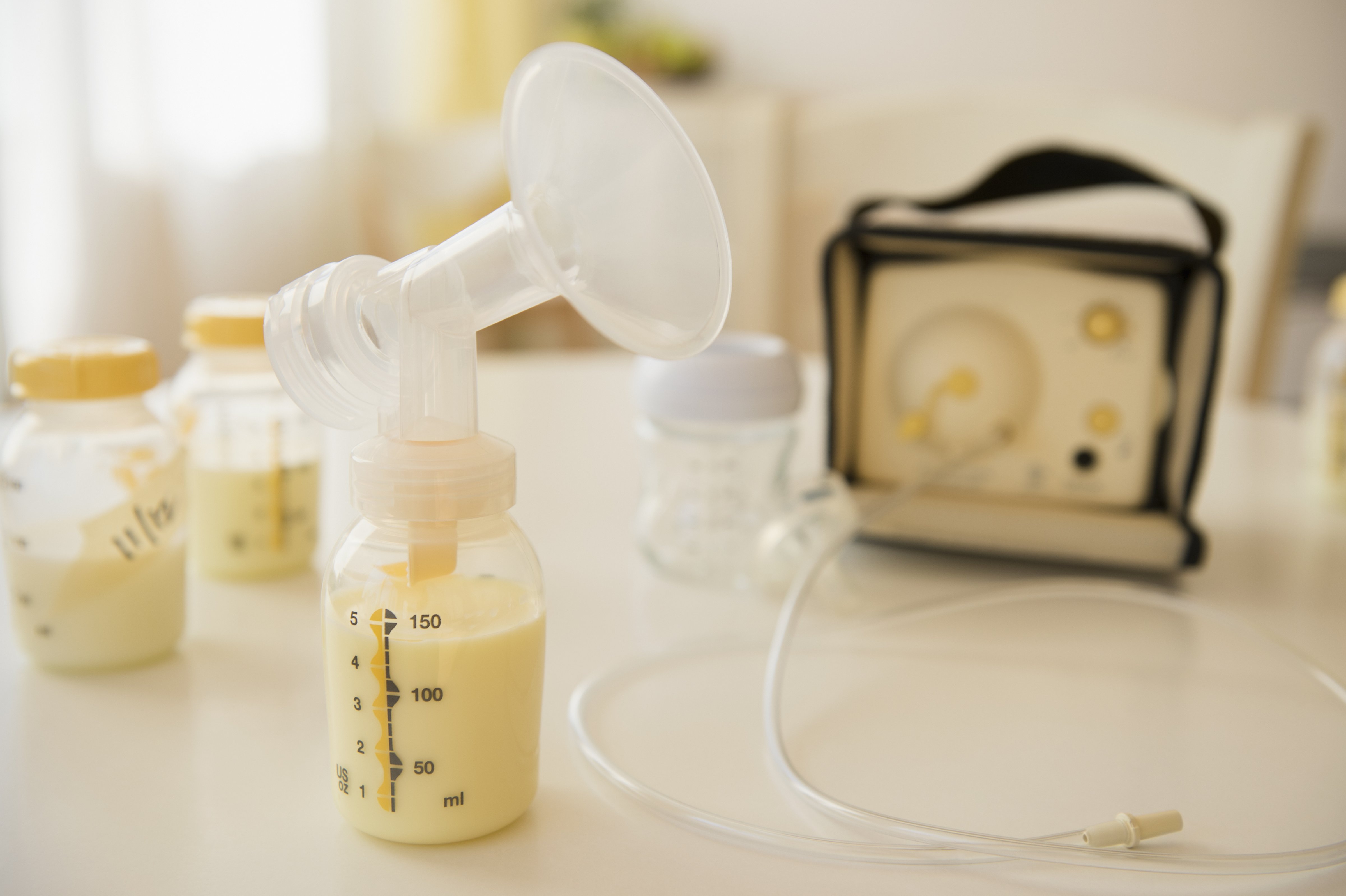 Breast pump with bottles