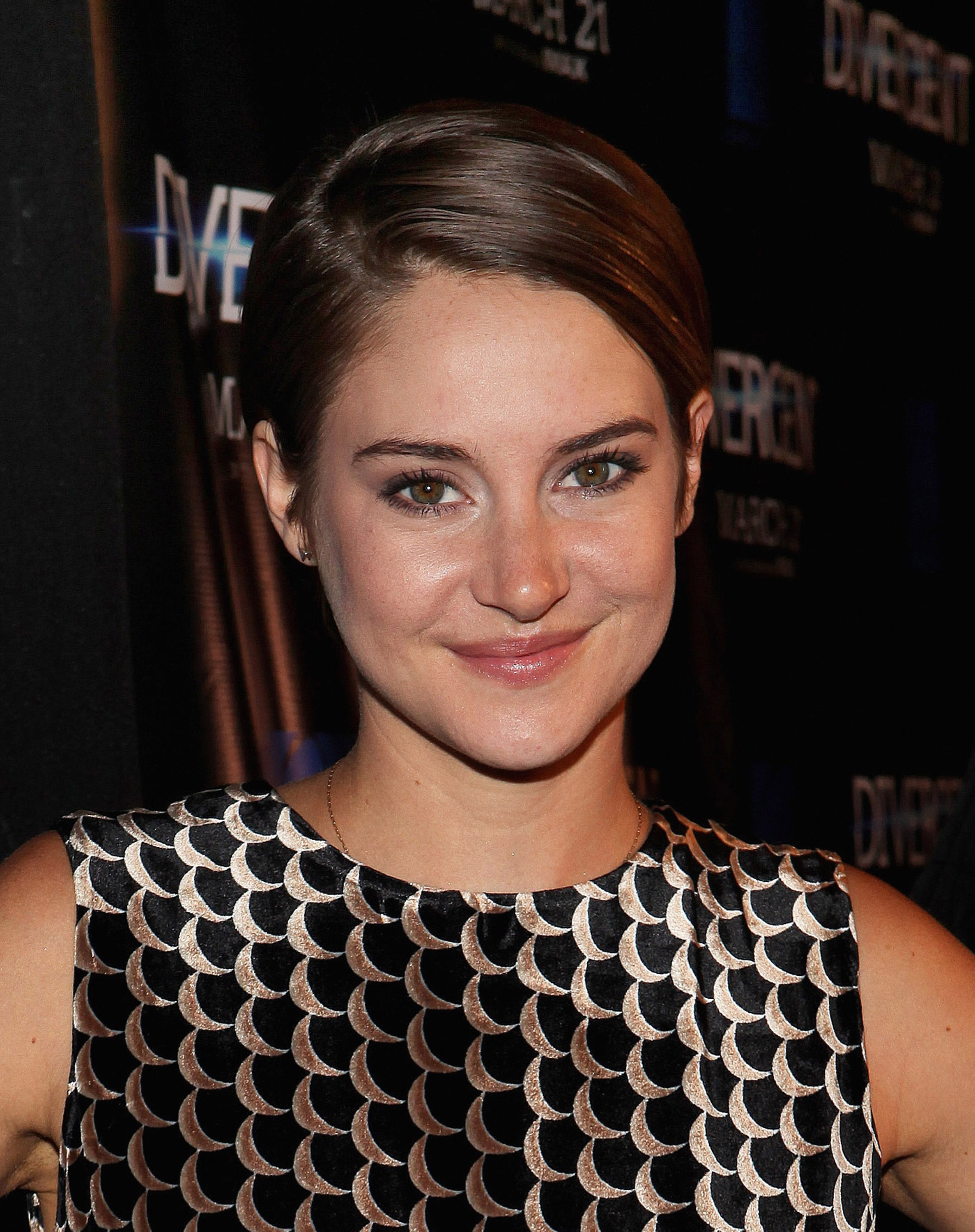 Actress Shailene Woodley poses for photos on the red carpet for the "Divergent" screening at Kerasotes Showplace ICON on March 4, 2014 in Chicago, Illinois (Raymond Boyd—Getty Images)