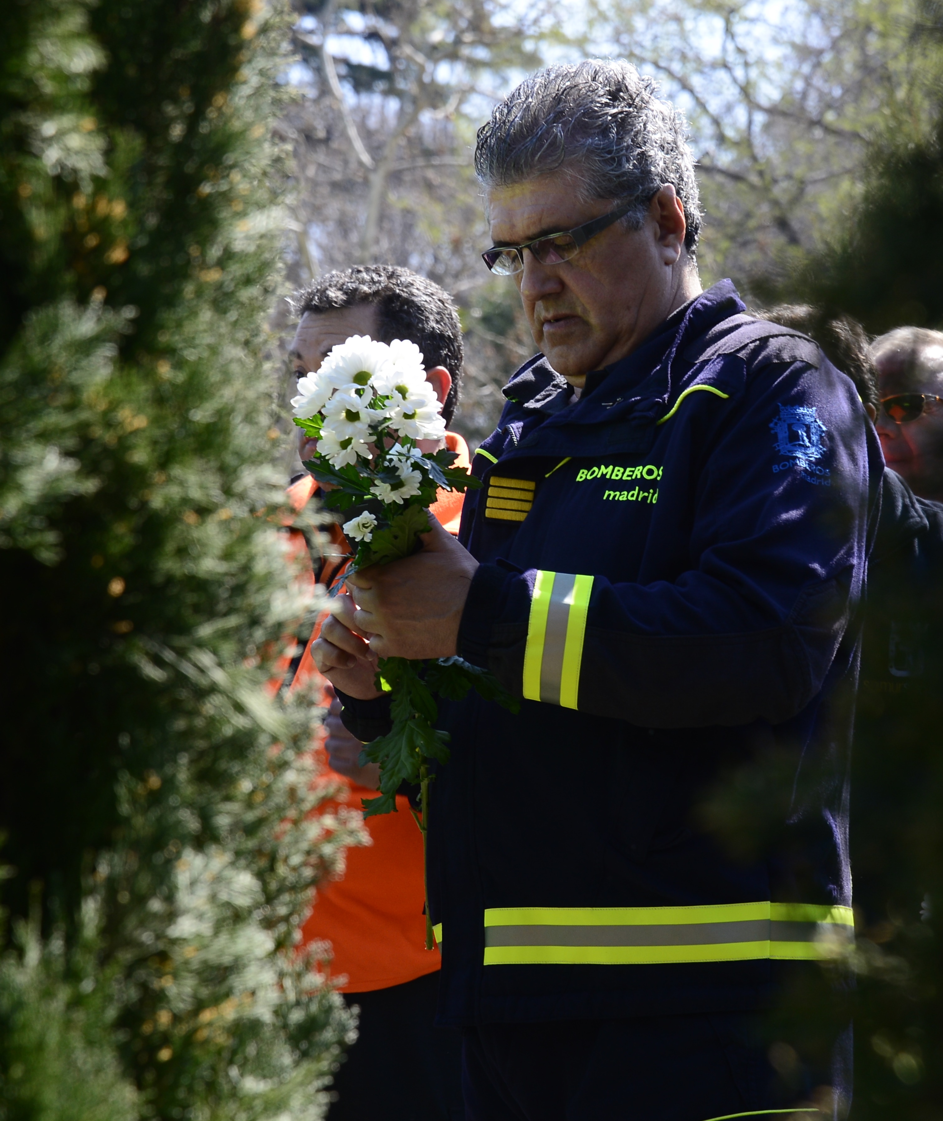 Local Police wait to lays flowers during a commemoration ceremony in held in the Rememberance Garden of Madrid's Retiro Park on March 11, 2014 (JAVIER SORIANO&mdash;AFP/Getty Images)