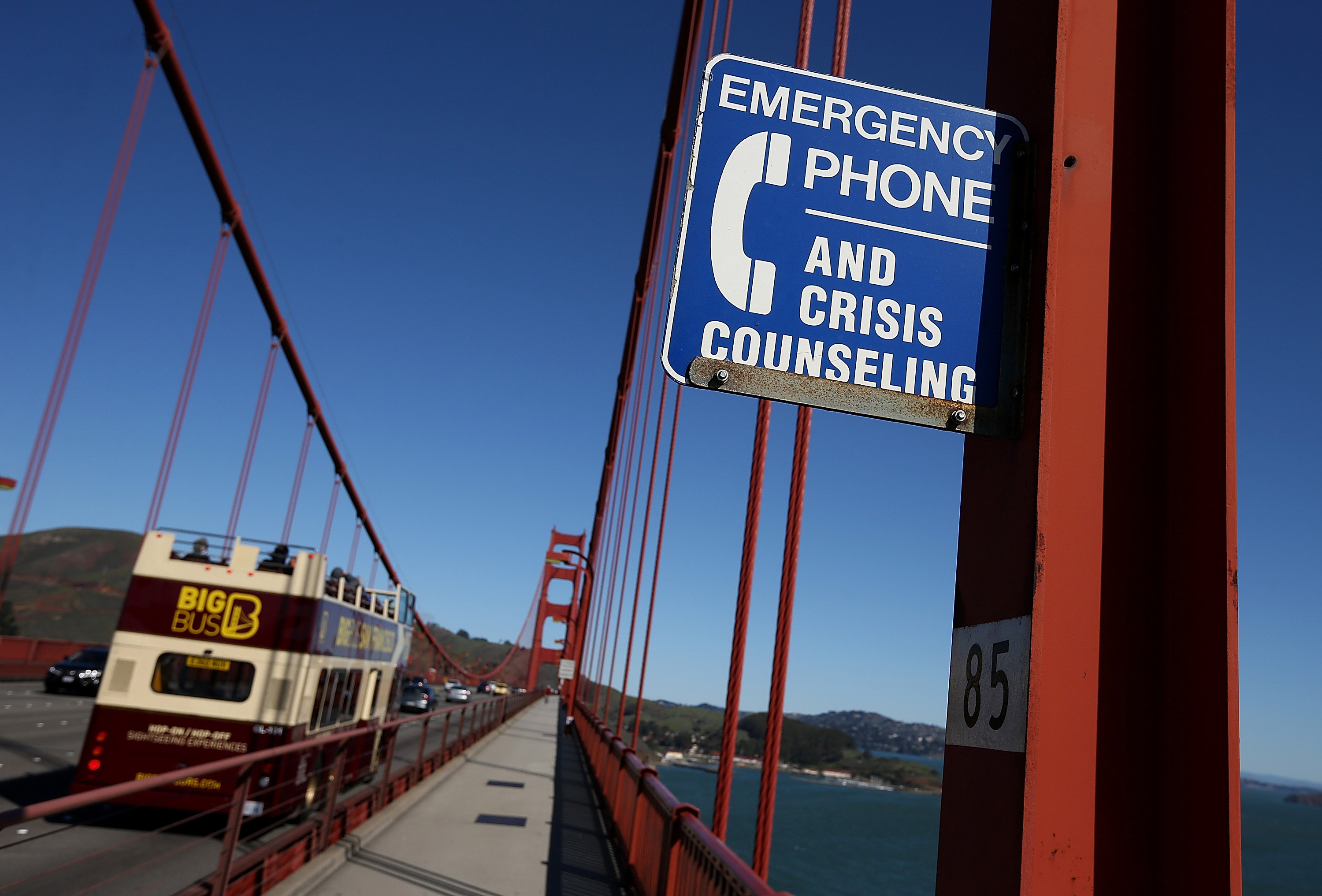 A sign alerting people to use an emergency crisis counseling phone if in distress. (Justin Sullivan&mdash;Getty Images)