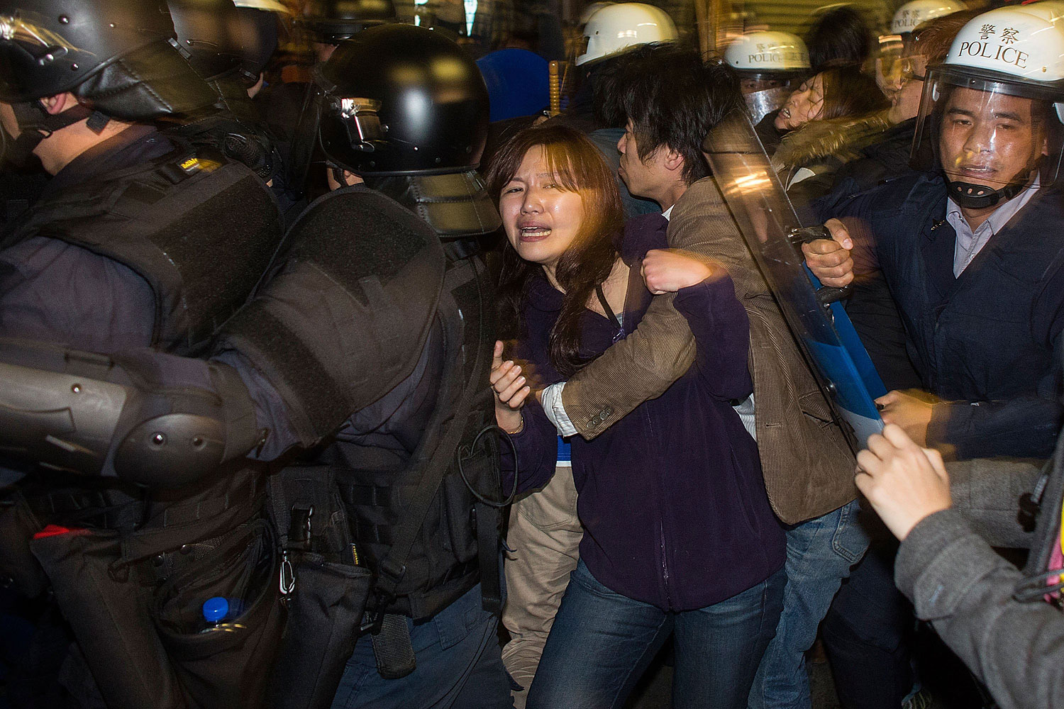 Riot police clash with student protesters outside the Executive Yuan, a branch of government in charge of administrative affairs for all of Taiwan on March 24, 2014 in Taipei, Taiwan.