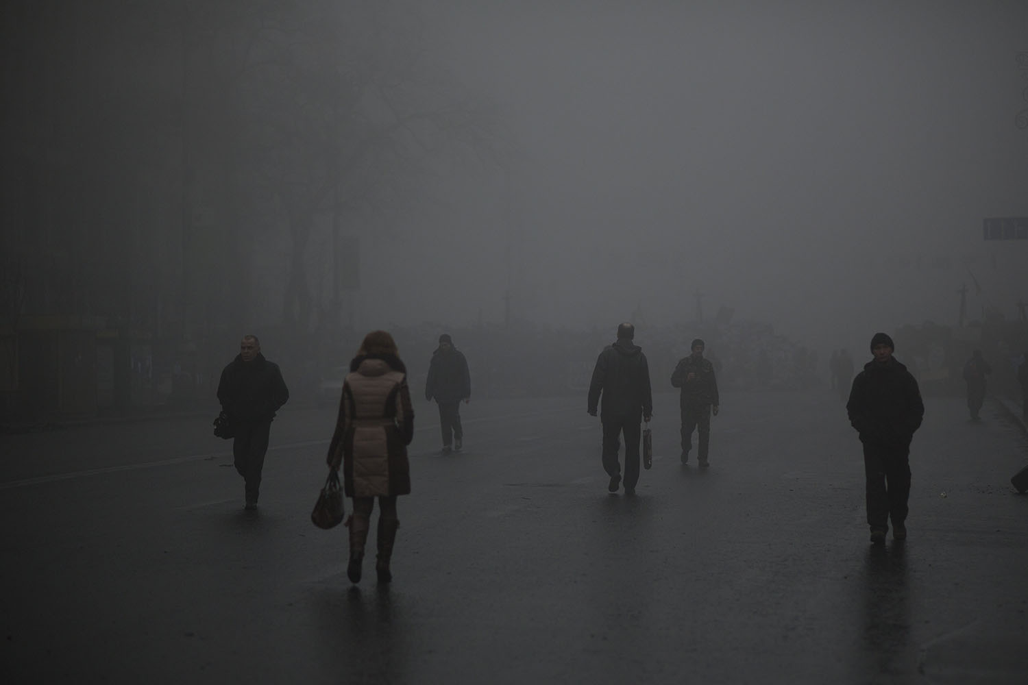 Mar. 4, 2014. People walk along a street heading to Kiev's Independence Square, Ukraine.