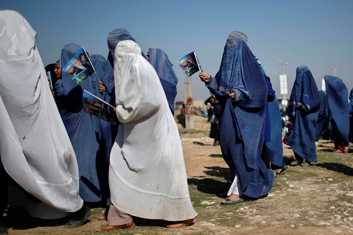 Mar. 28, 2014. Supporters of Afghan presidential candidate Abdullah Abdullah arrive to attend an election rally in Mazar-I-Shariff, northern Afghanistan.