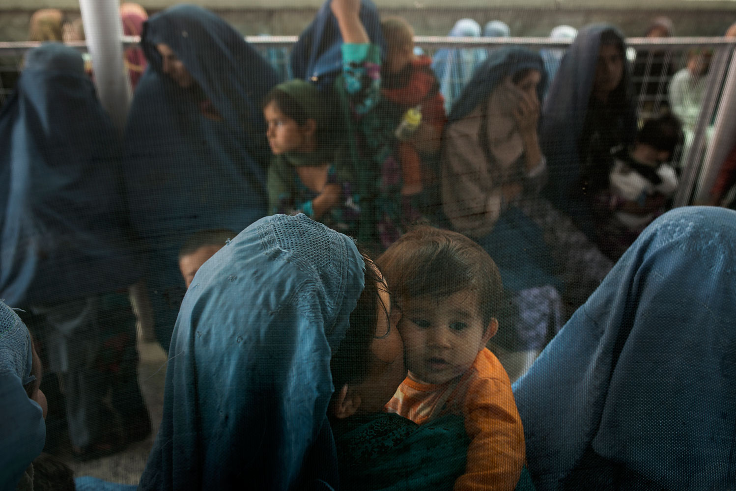 Women wait for services at the Ahmed Shah Baba Hospital in Kabul. Over 600 patients come through the hospital a day.