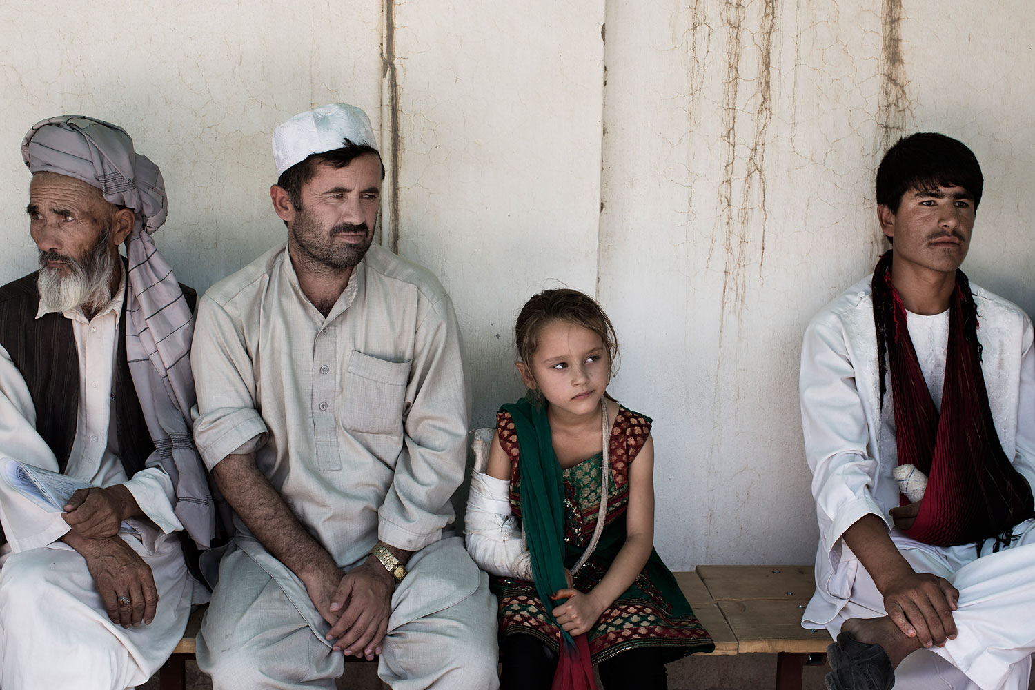 OPD patients wait for appointments outside at the Kunduz Trauma Centre in Kunduz, Northern Afghanistan.