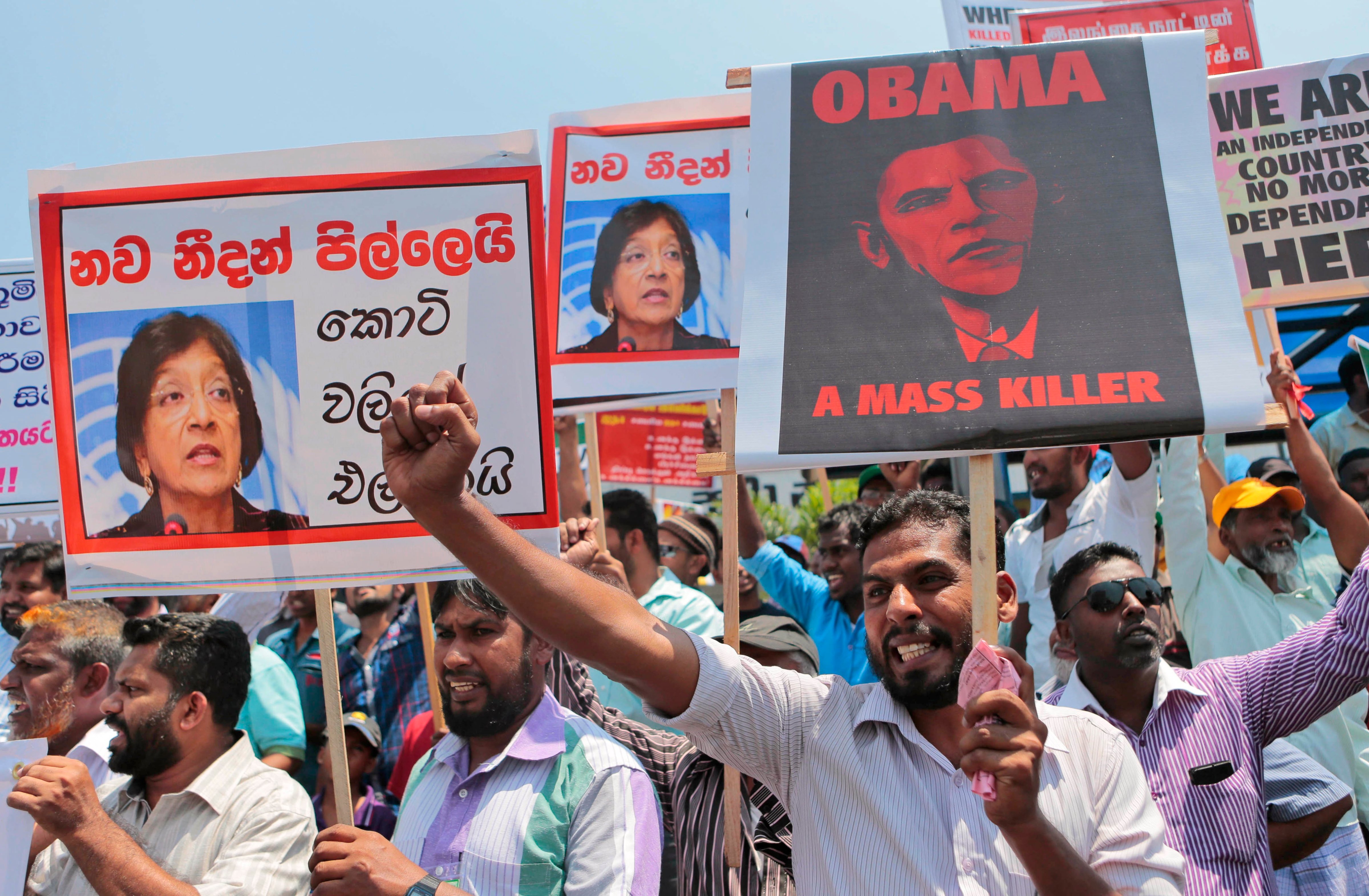 Sri Lankan government supporters demonstrate prior to the vote by the U.N. Human Rights Council (AP)